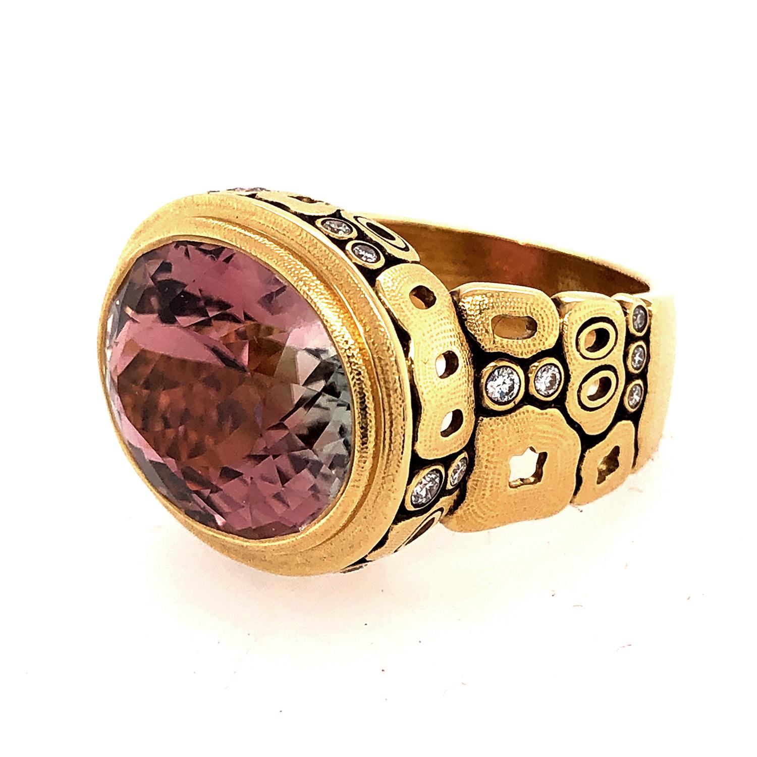 From the studio of Alex Sepkus in New York - 18 karat yellow gold ring with stunning oval shaped faceted bicolor  tourmaline, set with 20 brilliant cut white diamonds. This ring is of heirloom quality you love and expect from Alex Sepkus.

Bicolor
