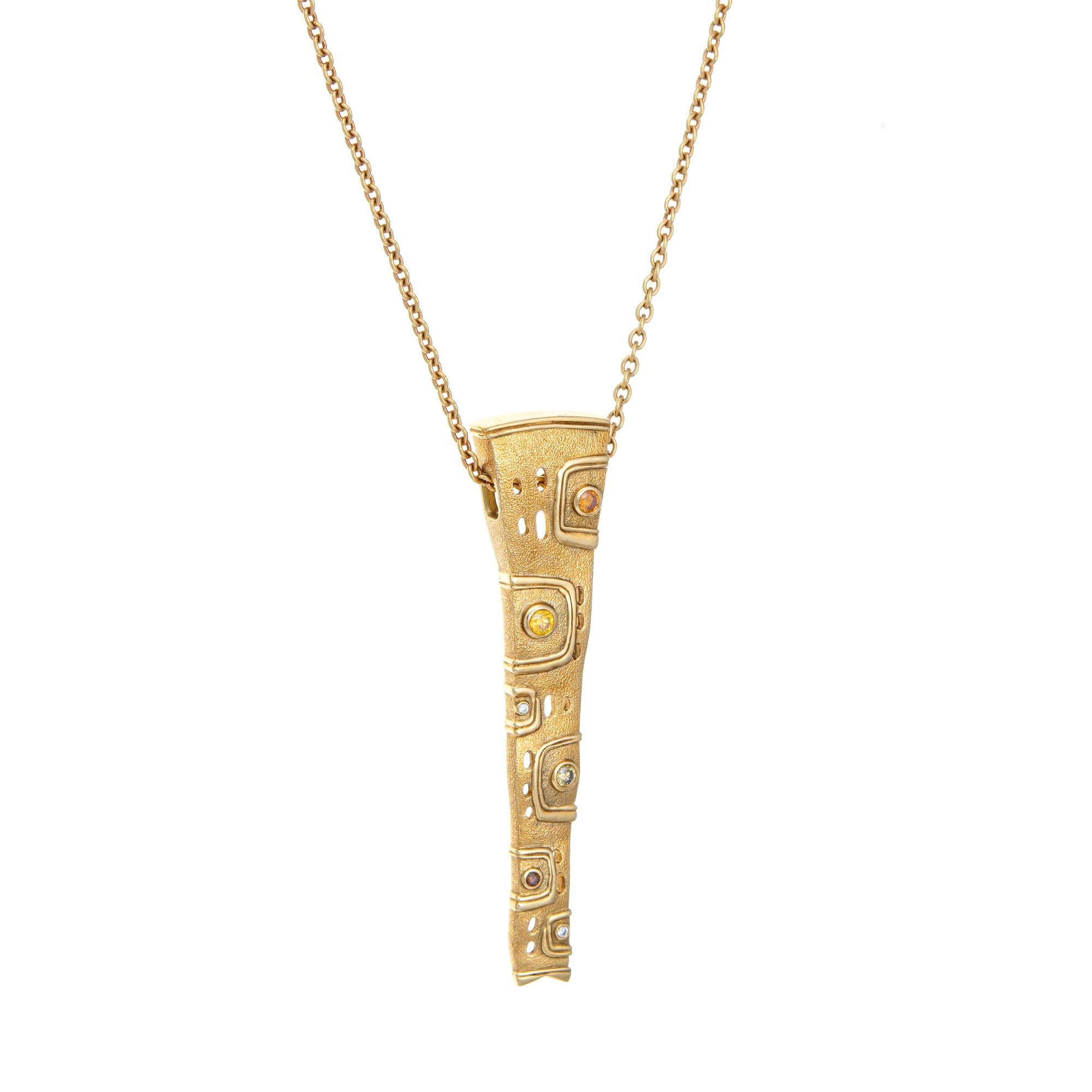 Finely detailed Alex Sepkus colored diamond pendant crafted in 18 karat yellow gold. 

4 colored diamonds and 2 small white diamonds are set into the pendant. The pendant comes with a 17 1/2 inch necklace (signed Schoeffel) and is great worn alone