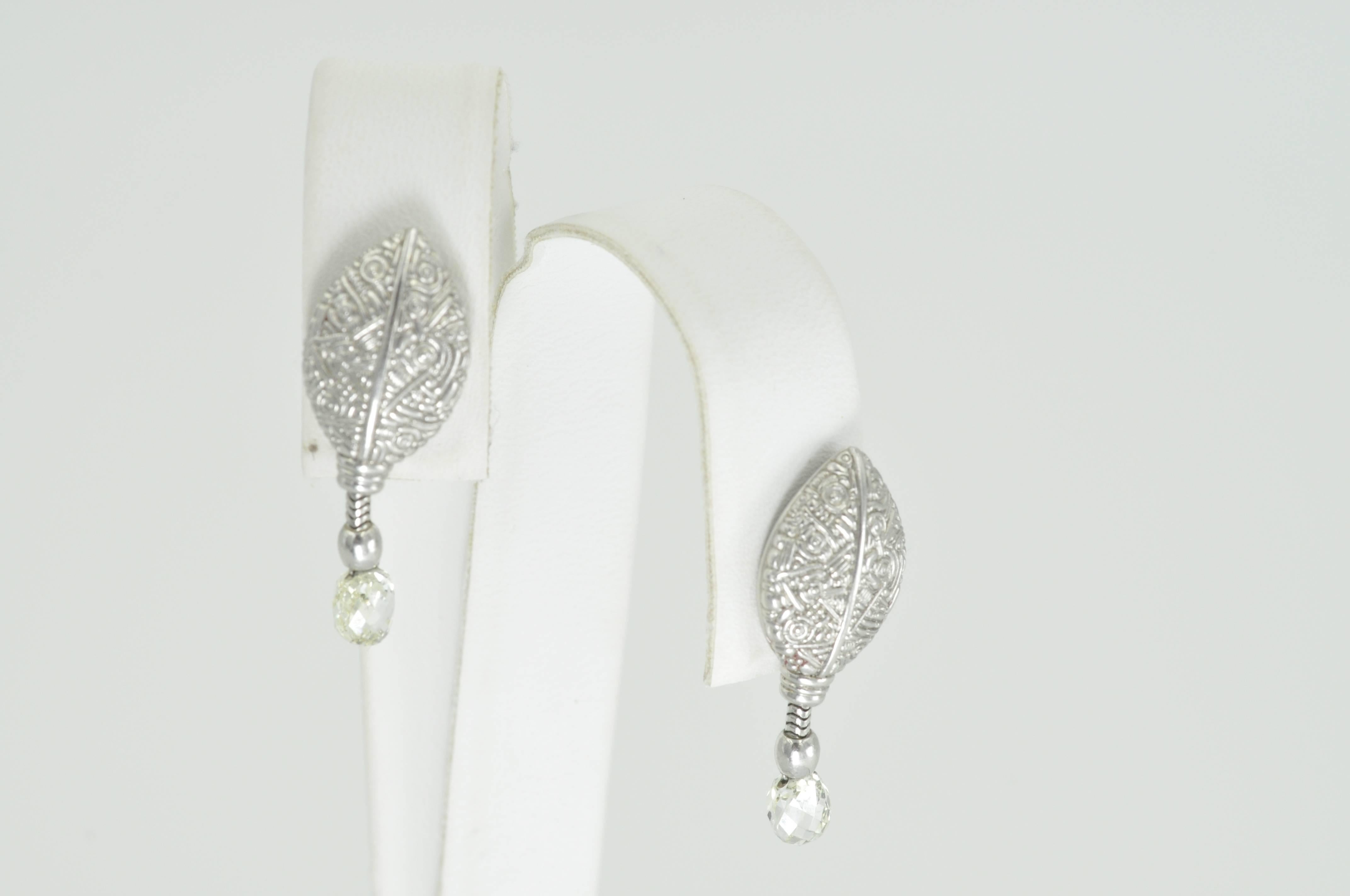 Alex Sepkus style is absolutely manifest in his Platinum Leaf Earrings with Diamond Briolet and .6CTW Diamonds. Though the design is bold, the earrings remain feminine transitioning wonderfully from casual to elegant occasions.   