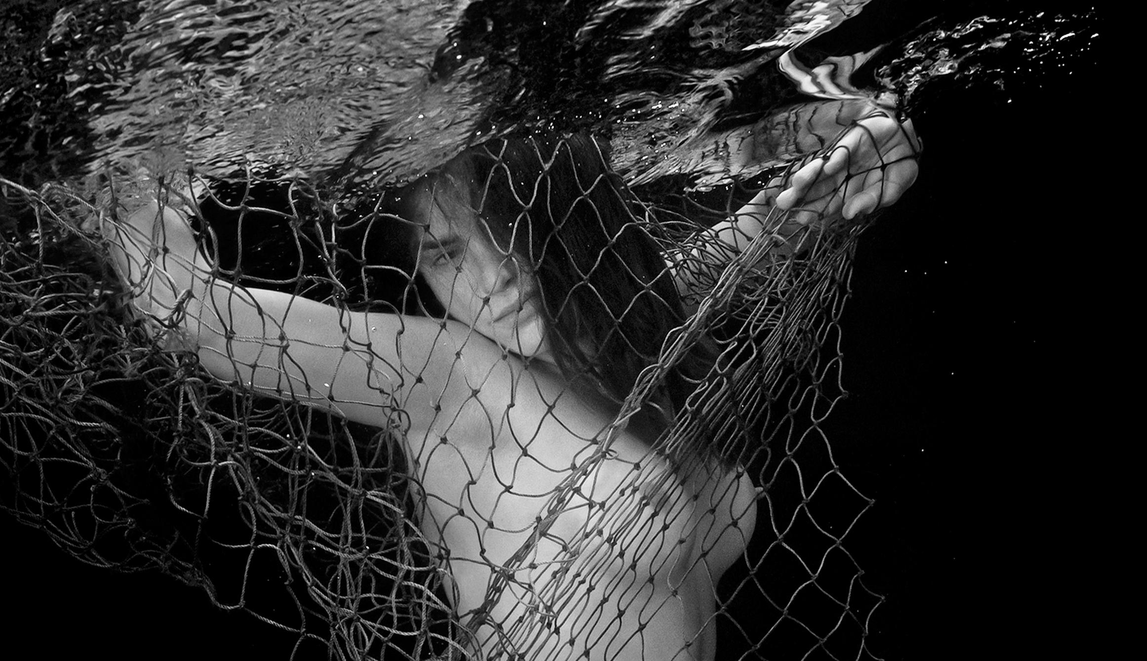 Miraculous Catch - underwater black&white nude photograph archival pigment 35x23 - Photograph by Alex Sher