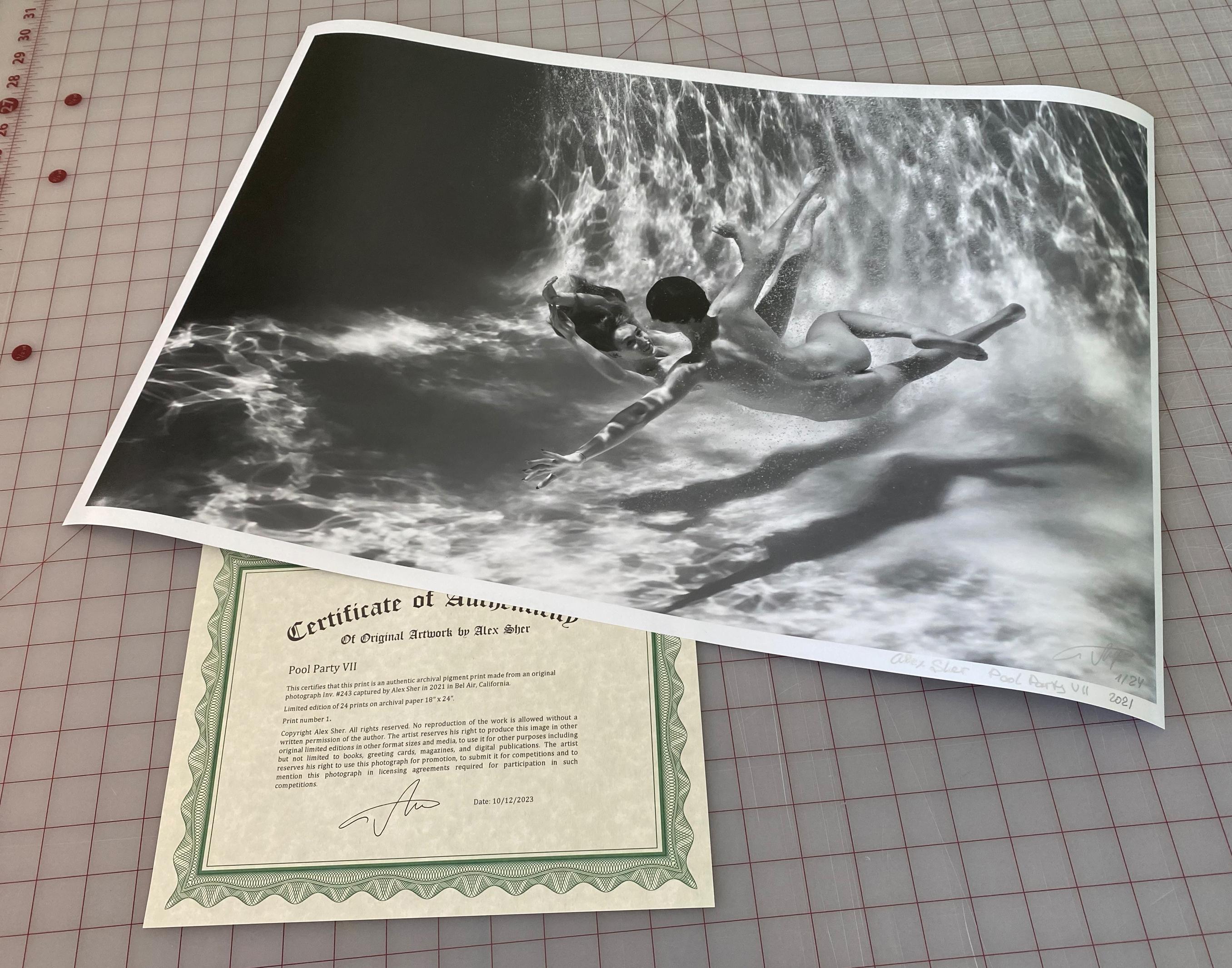 An underwater black and white photograph of young women diving naked in a pool. 

Original gallery quality archival pigment print on archival paper signed by the artist.
Limited edition of 24
Paper size: 18x24