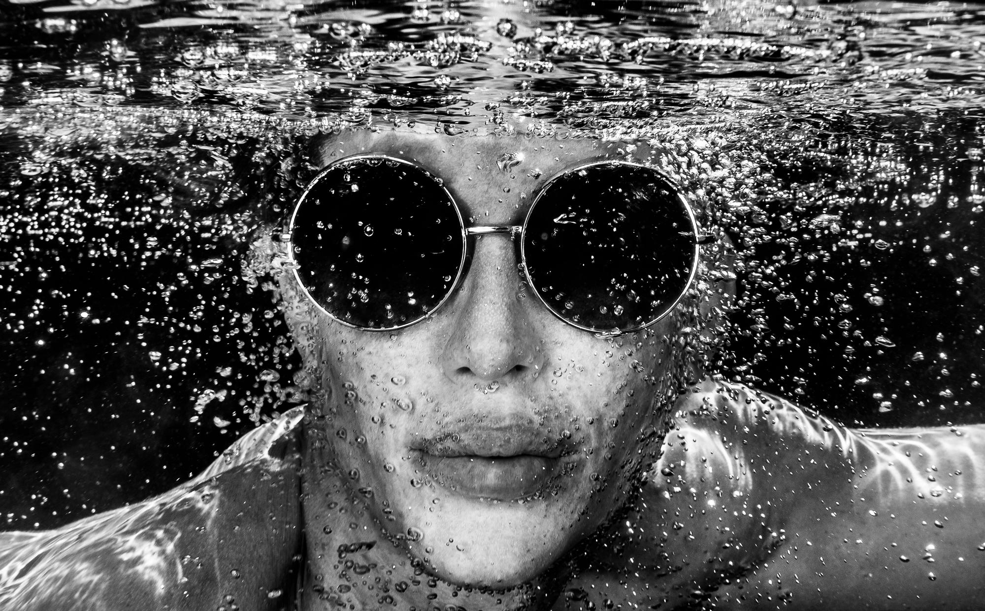Alex Sher Portrait Photograph - Rounds  - underwater black and white photograph - archival pigment print 35x56"