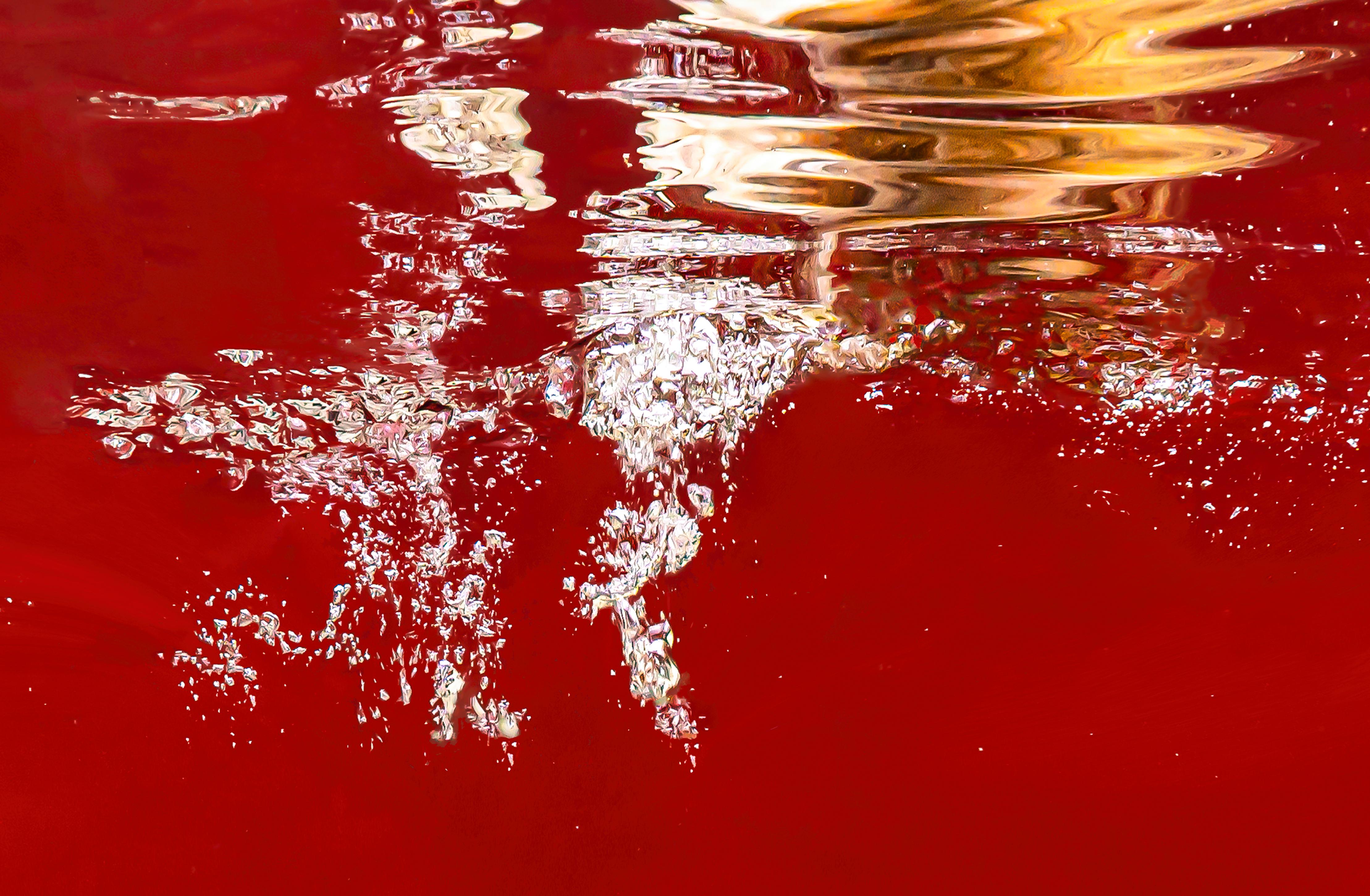 Spark - underwater photograph - from series REFLECTIONS - archival pigment print - Red Abstract Photograph by Alex Sher