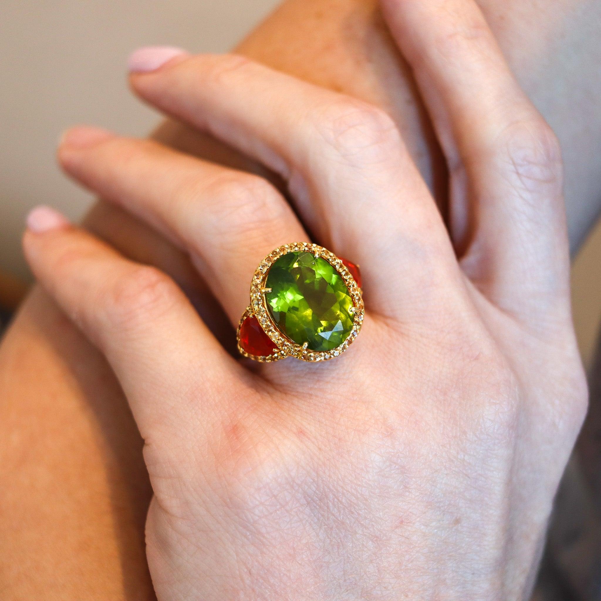 A cocktail ring designed by Alex Soldier.

This is a beautiful colorful cocktail ring created by the Russian born artist Alex Soldier, back in the 2000. The ring has been crafted with classic patterns in solid yellow gold of 18 karats with polished
