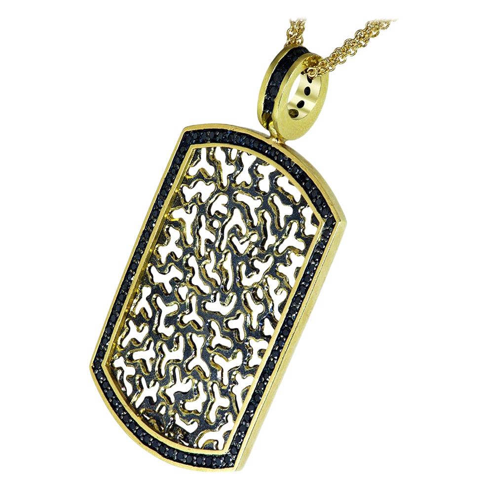 Alex Soldier Tag: made in 18 karat yellow gold with black diamonds (0.5 ct.) and signature metalwork suspended on 18-inch multi gold chain. Handmade with love in NYC from responsibly sourced materials. 
About The Artist:
Known for his elaborate
