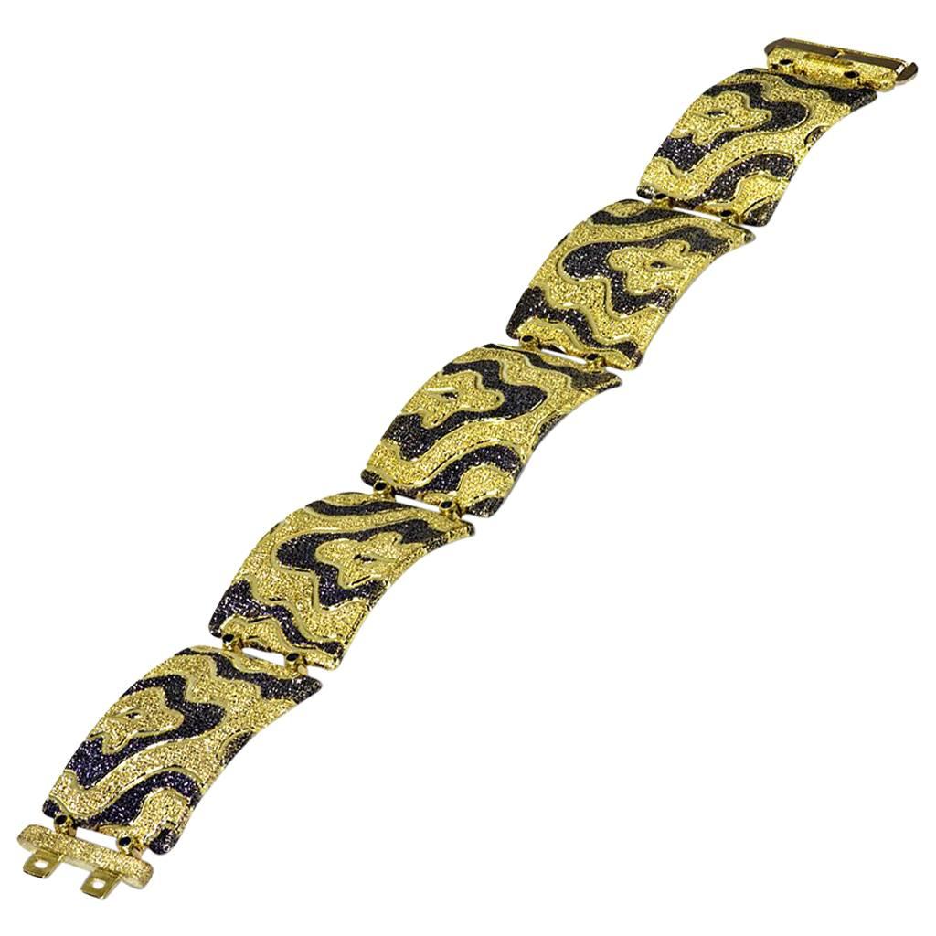 Alex Soldier Gold Cora link bracelet made in 18 karat yellow gold with black rhodium (platinum family), and finished with signature proprietary metalwork that creates an illusion of a diamond inlay. Handcrafted with love in NYC from responsibly