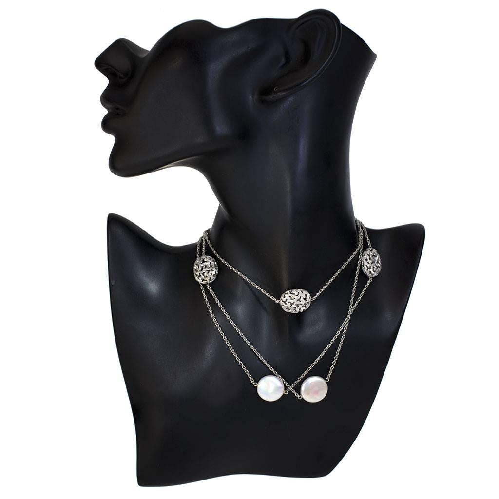 Alex Soldier Moneta Necklace: made in 14 karat white gold with 4 Freshwater pearls (17 mm diameter each) and signature proprietary metalwork that creates an illusion of a diamond inlay. The necklace features a clasp that allows it to be wrapped