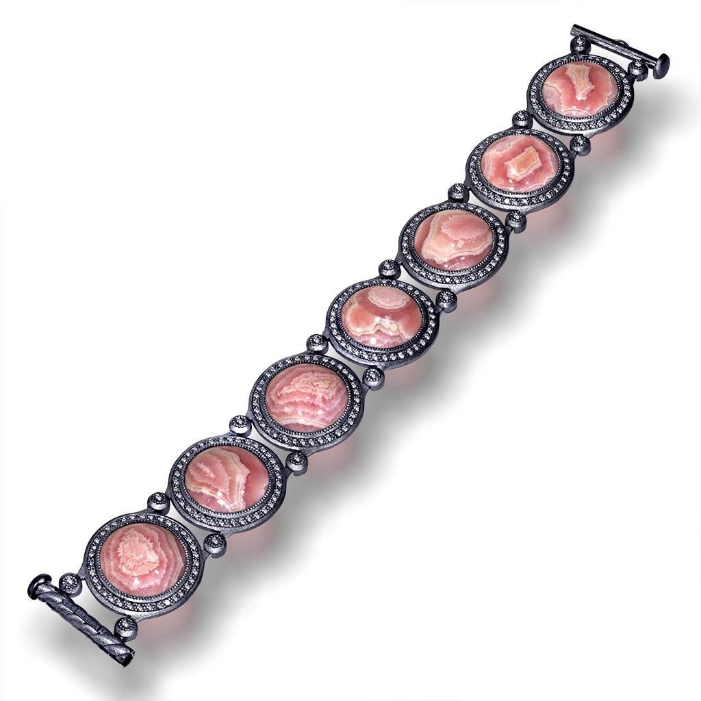 Inspired by the grandeur of antiquity, the Symbolica collection is enriched with meaning. The hand-carved gallery on the back of the bracelet creates an illusion of ancient symbols that in turn form an aura of timeless mystery. Handcrafted with love