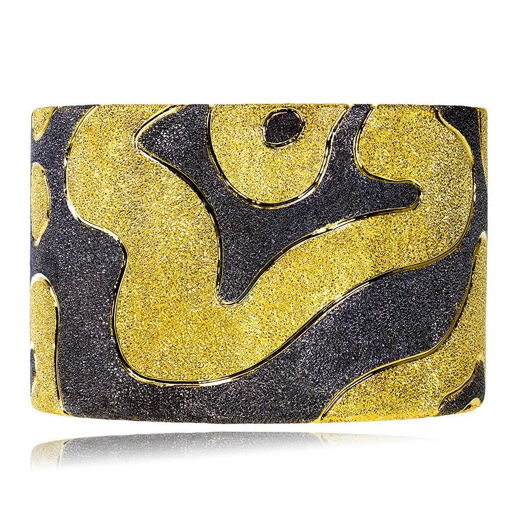 Alex Soldier Cuff with Cora motif: made in silver with 24 karat yellow gold and dark platinum (black rhodium) infusion. Handmade in NYC, it features double hinges for extra comfort and is finished with proprietary metalwork that creates an illusion