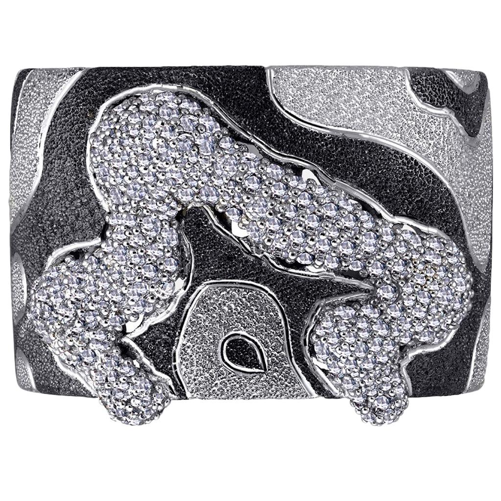 Since ancient times, wide bracelets or cuffs formed an essential part of women's and men's wardrobes. Made of precious metals, they served not only as an ornament but also as a talisman. It was believed that a cuff, tightly fitting the wrist, would