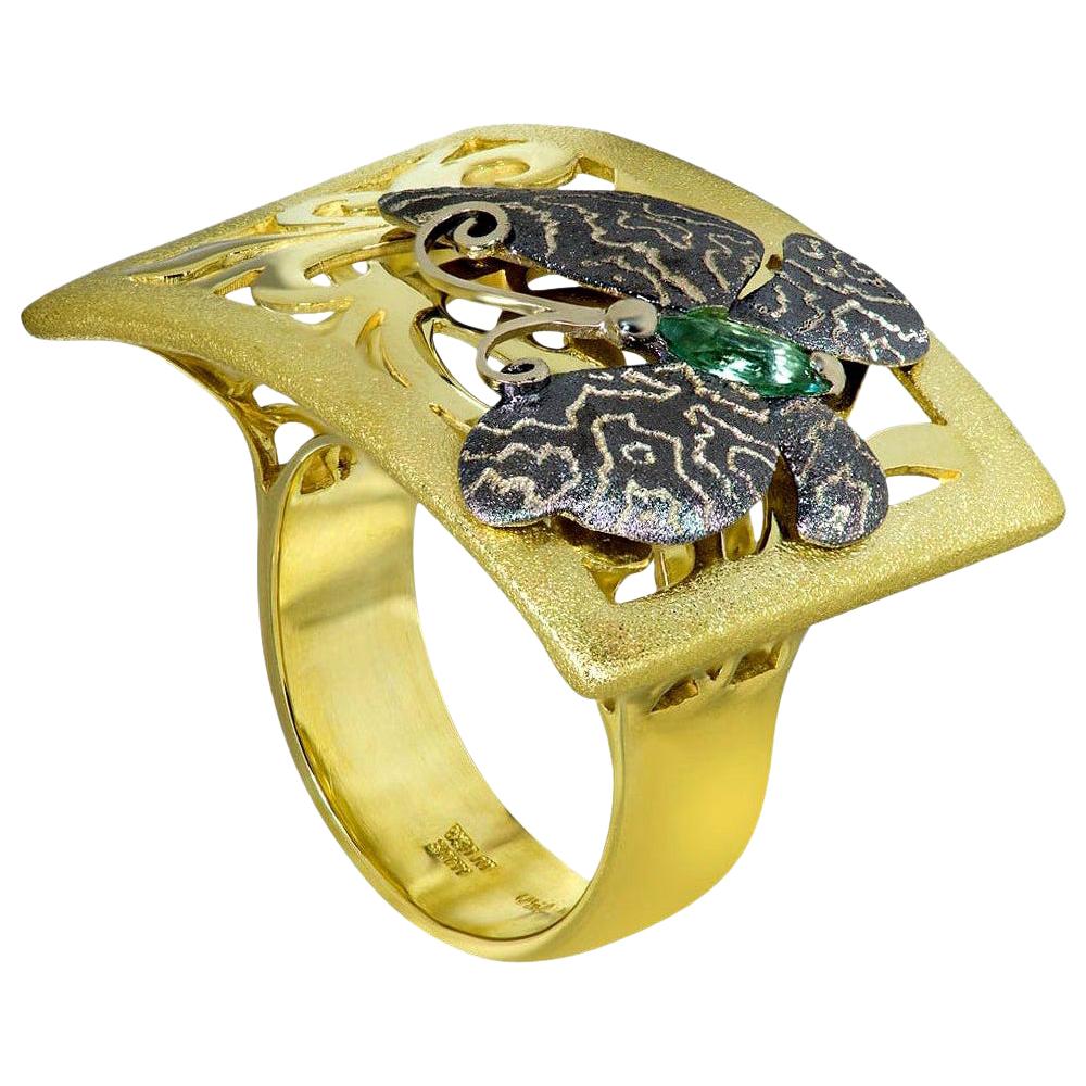 Alex Soldier's Butterfly collection is dedicated to celebration of life. Butterflies remind us to enjoy the moment and embrace change. Made in 18 karat yellow gold with green tourmaline (0.3 ct.), this lovely butterfly ring is finished with Alex