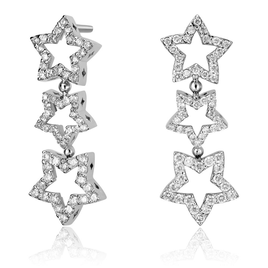 As if formed by a spectacular event of cosmic proportions in the heart of the Universe,  Alex Soldier's divine Diamond Trinity Star drop earrings beam a spotlight on a superstar in You. Shine on like a true star that you are and light the way for