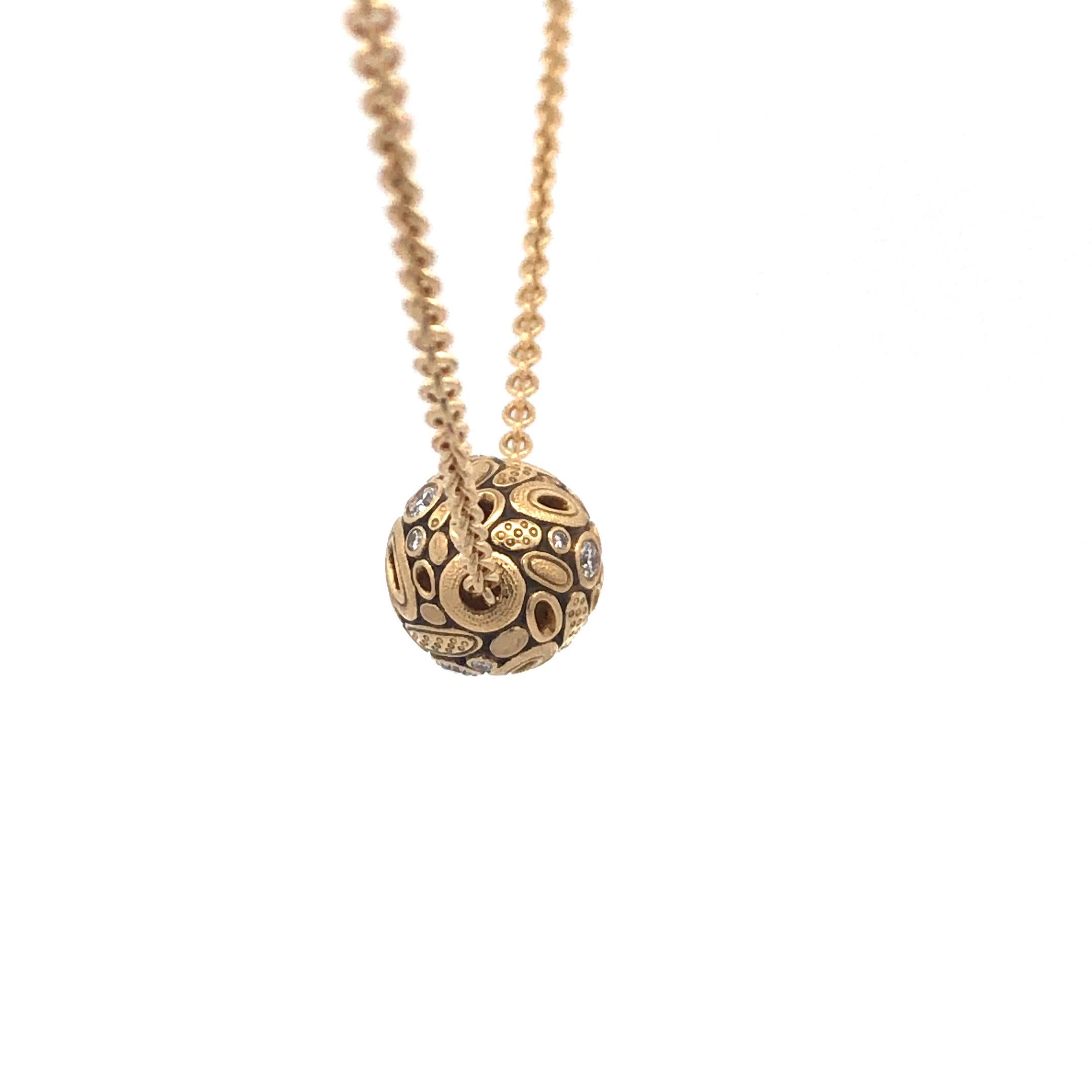 18K Yellow Gold and Diamond 'Open Ovals' Ball Pendant
The pendant features 12 diamonds 0.36ctw 
on 18K, 18