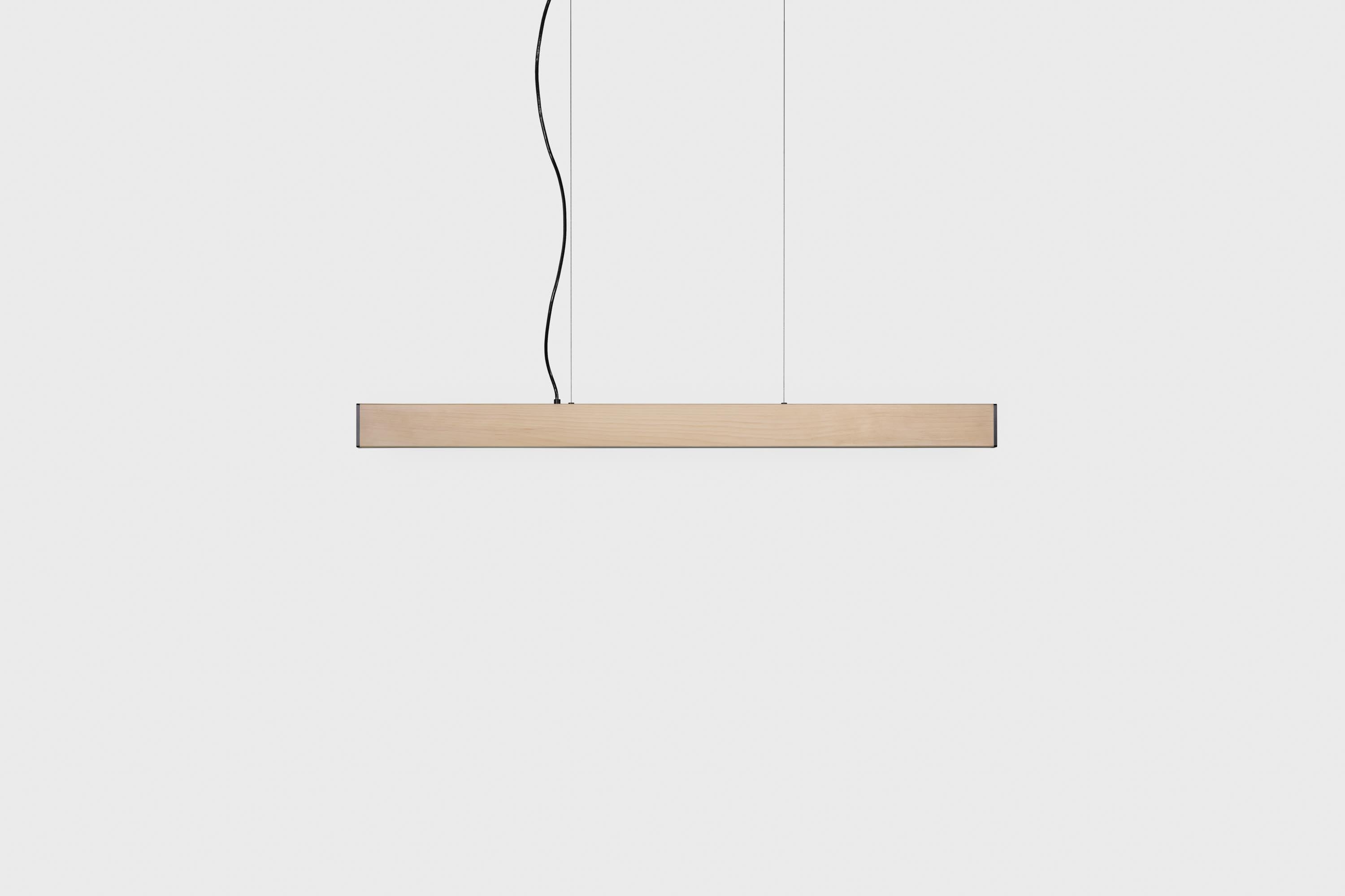 The 2x4 Pendant is made from the most common piece of dimensional lumber, the simple 2x4. The 2x4 celebrates the minimal and the ordinary. It is simple and true to its form, and with some luxurious touches, the 2x4 is transformed into a beautiful