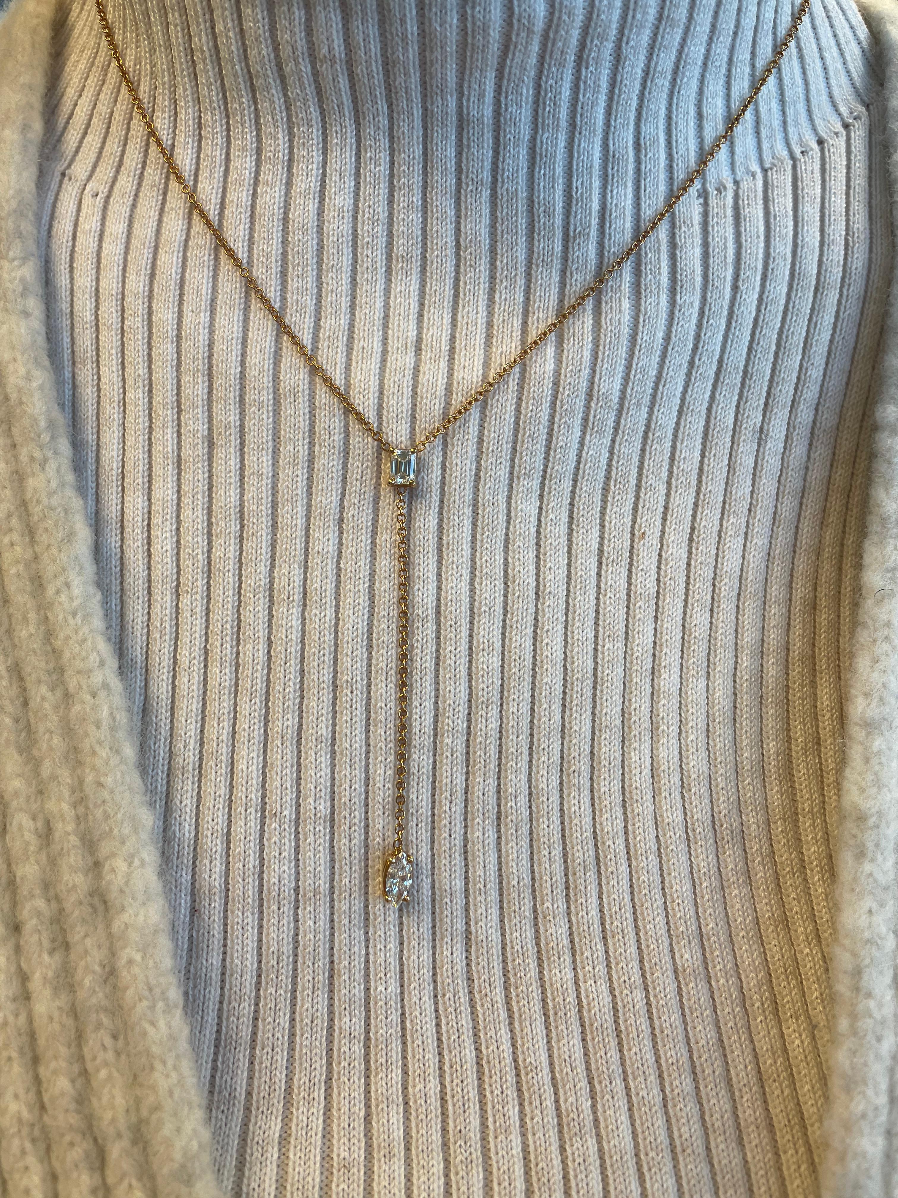 Exquisite double pear drop diamond necklace. By Alexander Beverly Hills.
2 emerald cut diamonds, 0.83 carats total. Approximately G/H color and VS clarity. Prong set in 18k rose gold, 4.31 grams. 
Accommodated with an up to date appraisal by a GIA