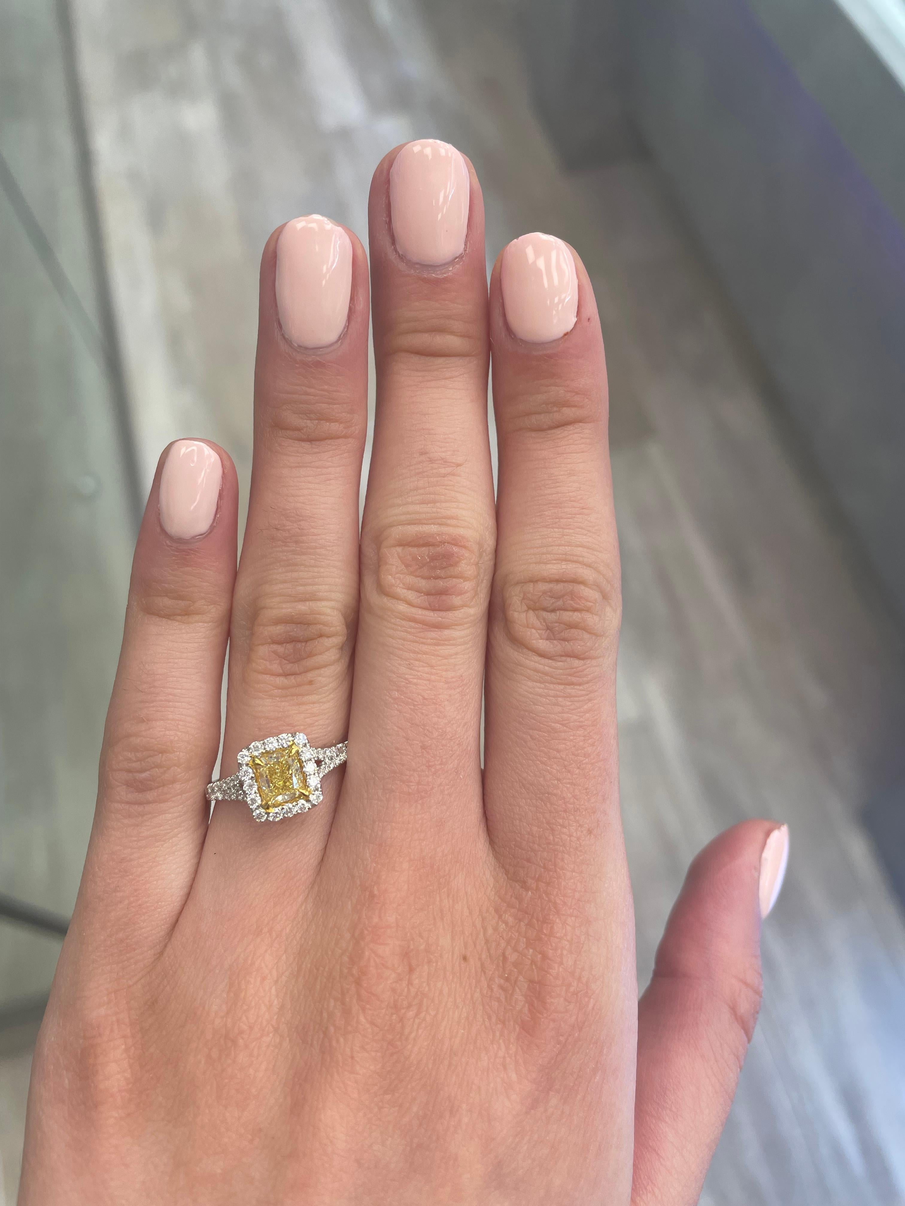 Stunning modern EGL certified yellow diamond with halo ring, two-tone 18k yellow and white gold. By Alexander Beverly Hills
1.51 carats total diamond weight.
1.00 carat cushion cut Fancy Intense Yellow color and SI1 clarity diamond, EGL graded.
