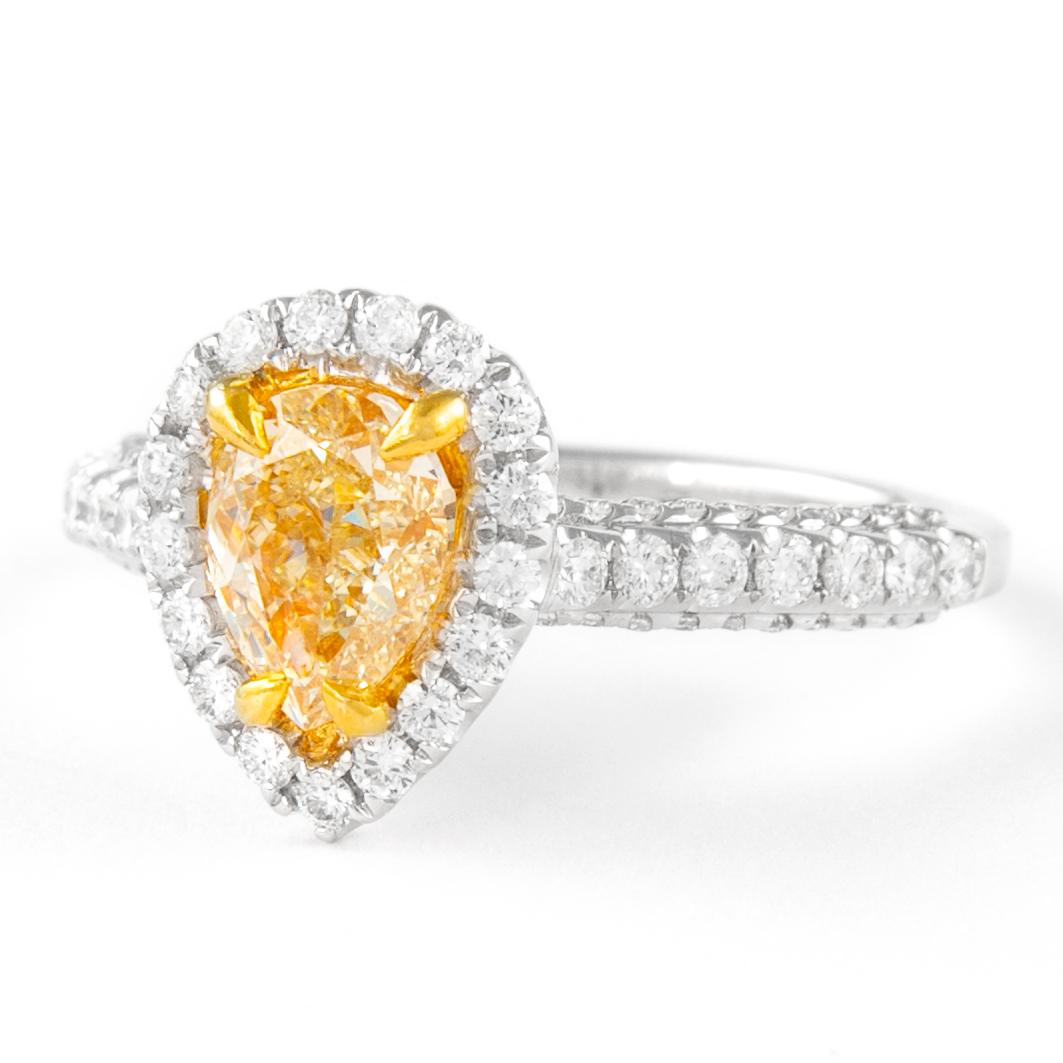 Contemporary Alexander 1.01ct Fancy Intense Yellow Pear Diamond with Halo Ring 18k For Sale