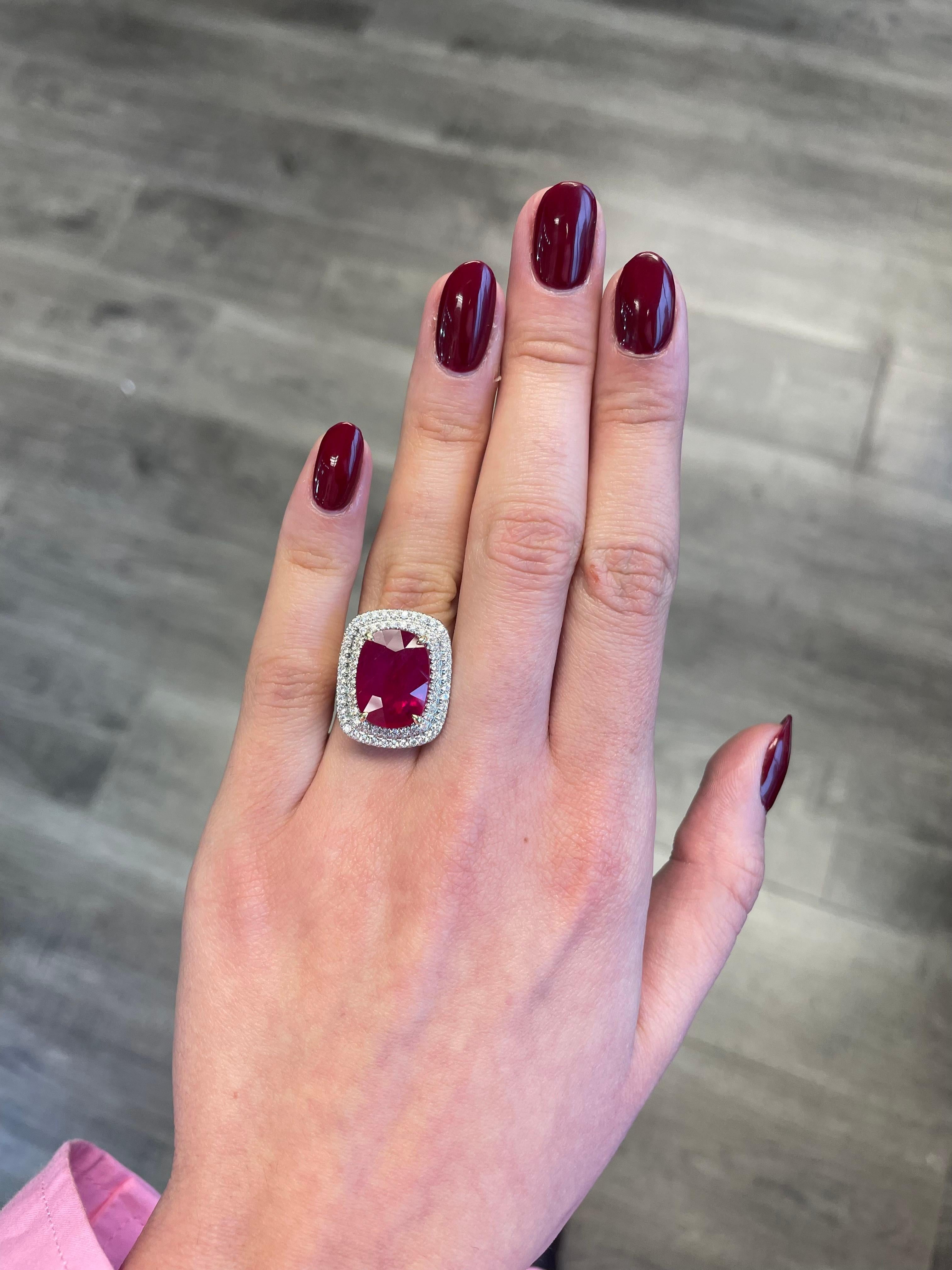 Beautiful Ruby with double diamond halo ring with diamonds going half way down the shank, pave set. High jewelry by Alexander Beverly Hills.
GIA certified
10.24 carat oval ruby, heat. Complimented with 104 round diamonds, 0.92ct. Approximately G/H