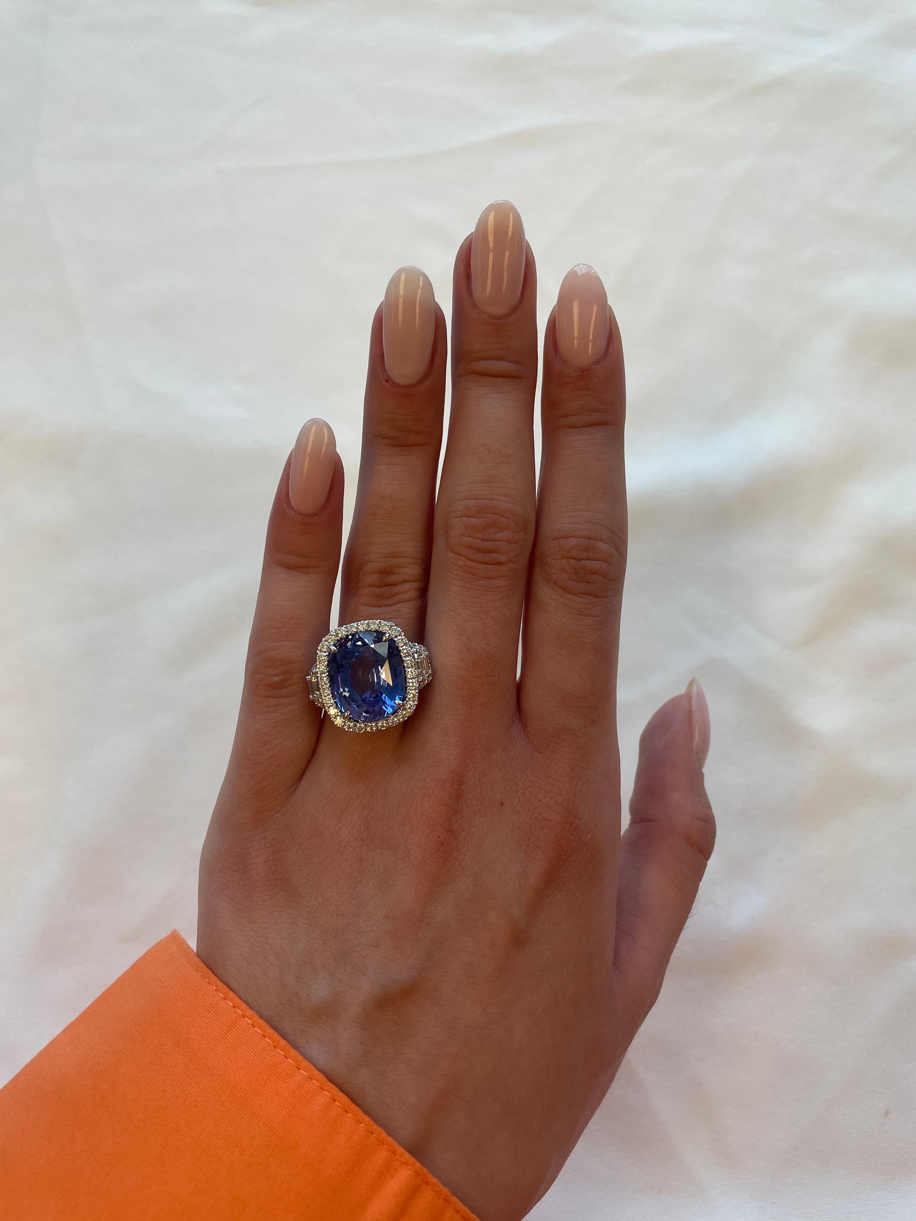 Stunning Ceylon sapphire and diamond halo ring, GIA certified. High jewelry by Alexander Beverly Hills. 
14.84 carats total gemstone weight.
GIA certified 13.20 carat cushion sapphire, Sri Lanka (Ceylon) origin, heat. Complimented with trapezoid and