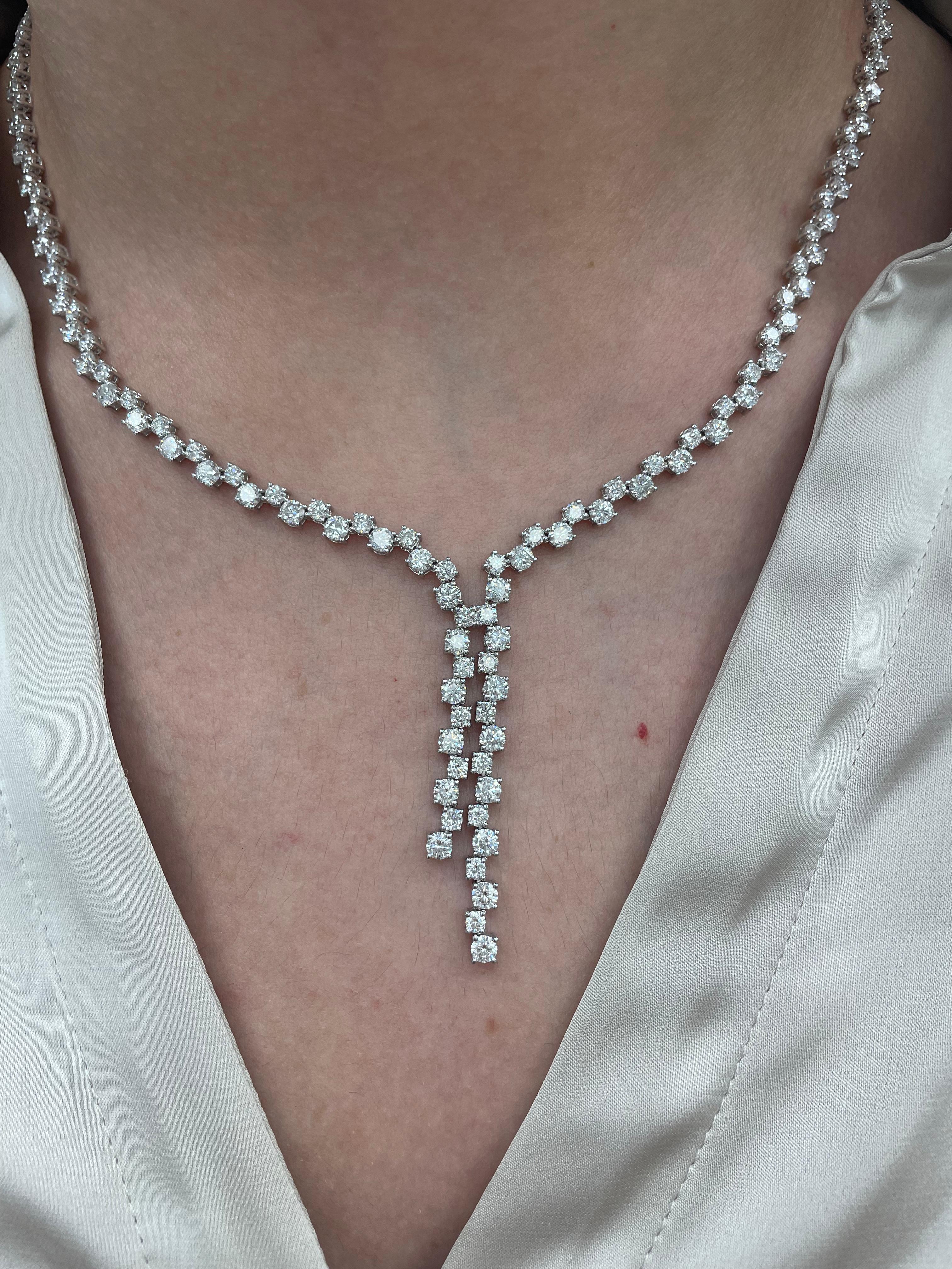 Exquisite diamond rain-fall drop necklace, by Alexander Beverly Hills.
163 round brilliant cut diamonds, 13.20 carats total. Approximately D-F color and VS2/SI1 clarity. Prong set in 18k white gold, 23.02 grams, and 16 inches.
Accommodated with an