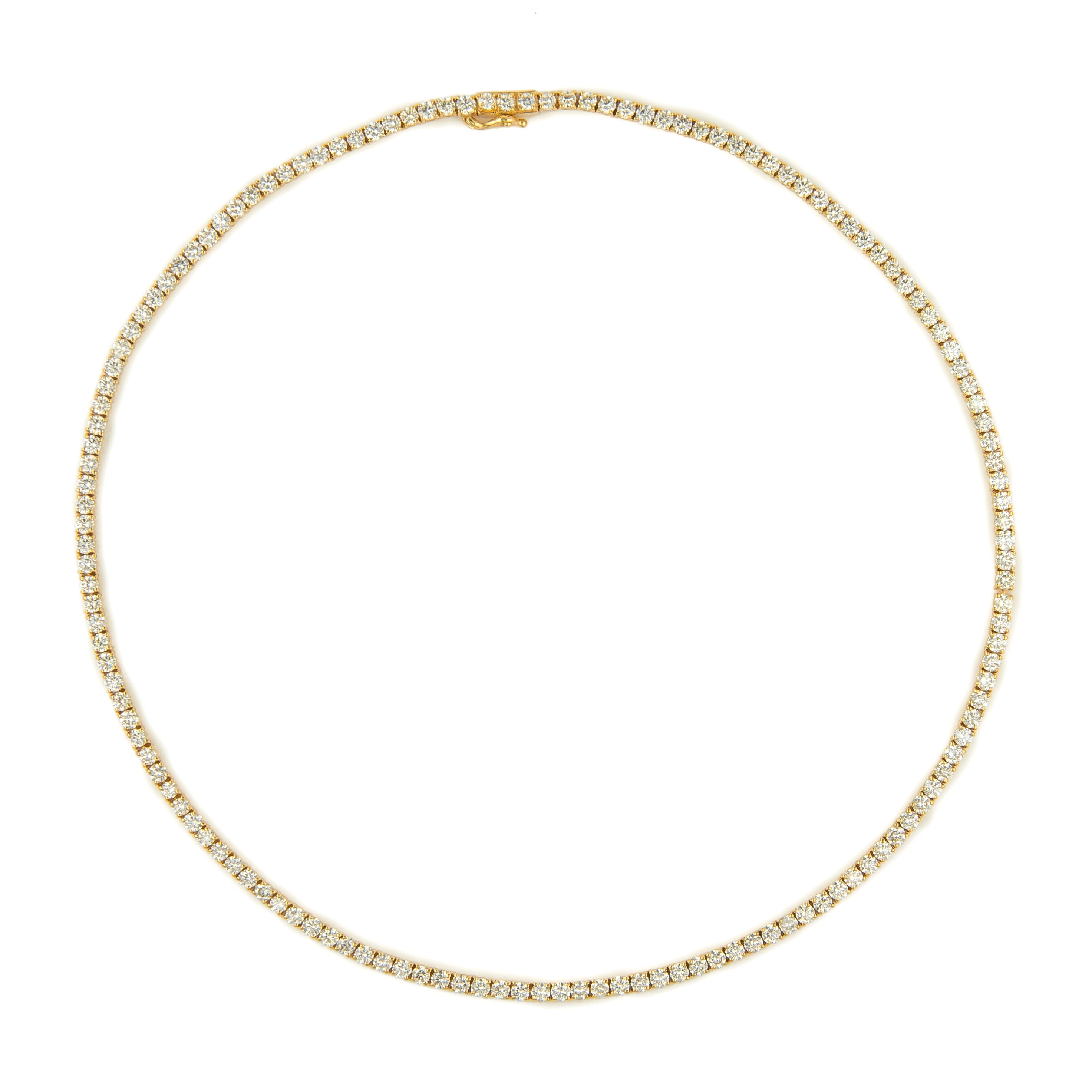 Beautiful modern diamond tennis necklace. Created by Alexander Beverly Hills.
142 round brilliant diamonds, 15.84 carats. Approximately H/I color and VS clarity. 18k yellow gold, 23.30 grams, 18.25in.
Accommodated with an up to date appraisal by a