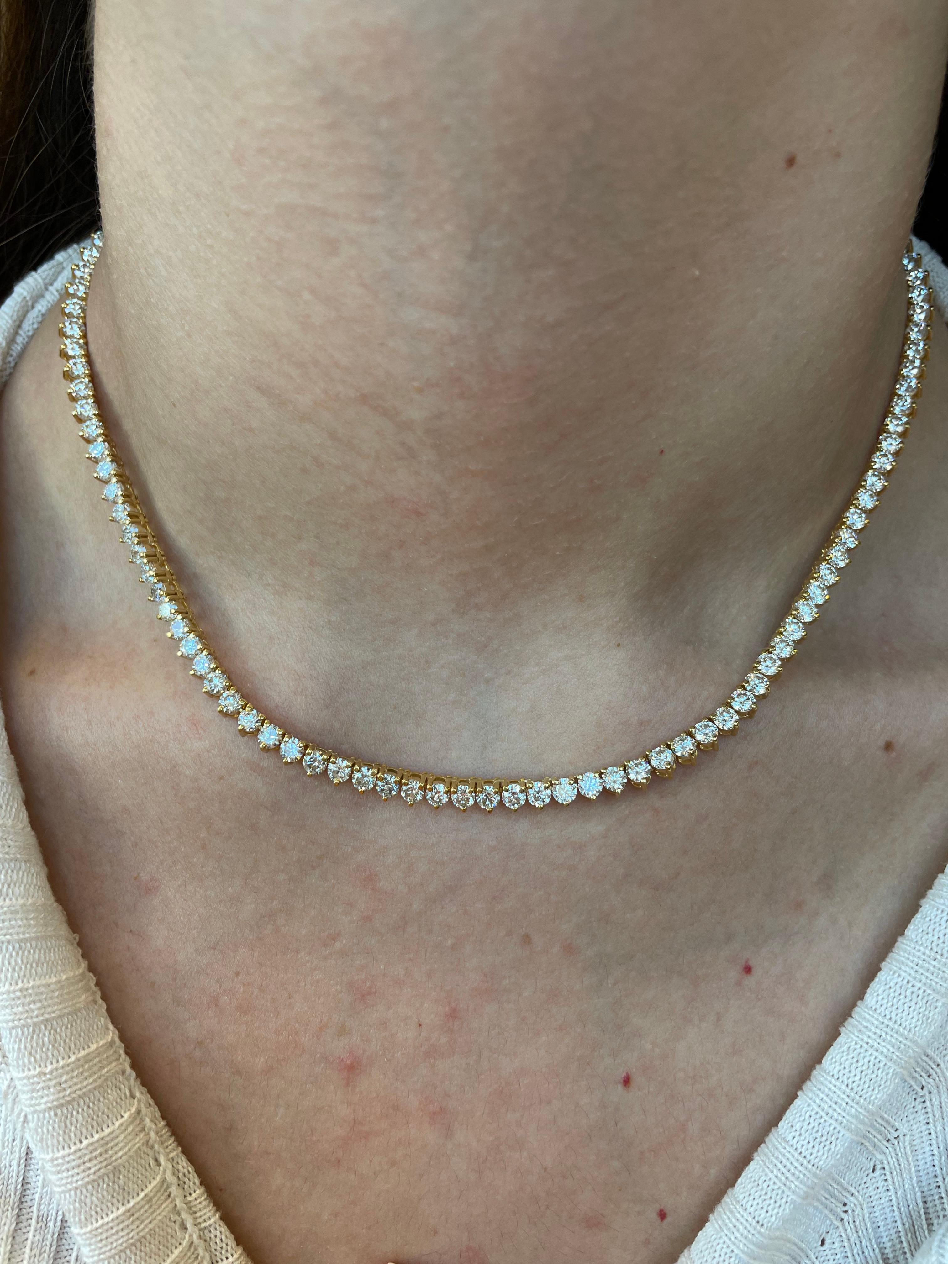 Beautiful and classic diamond tennis necklace, by Alexander Beverly Hills.
16.25 carats of round brilliant diamonds, approximately G/H color and VS2/SI1 clarity. 18k yellow gold, 29.63 grams, 16in.
Accommodated with an up-to-date appraisal by a GIA