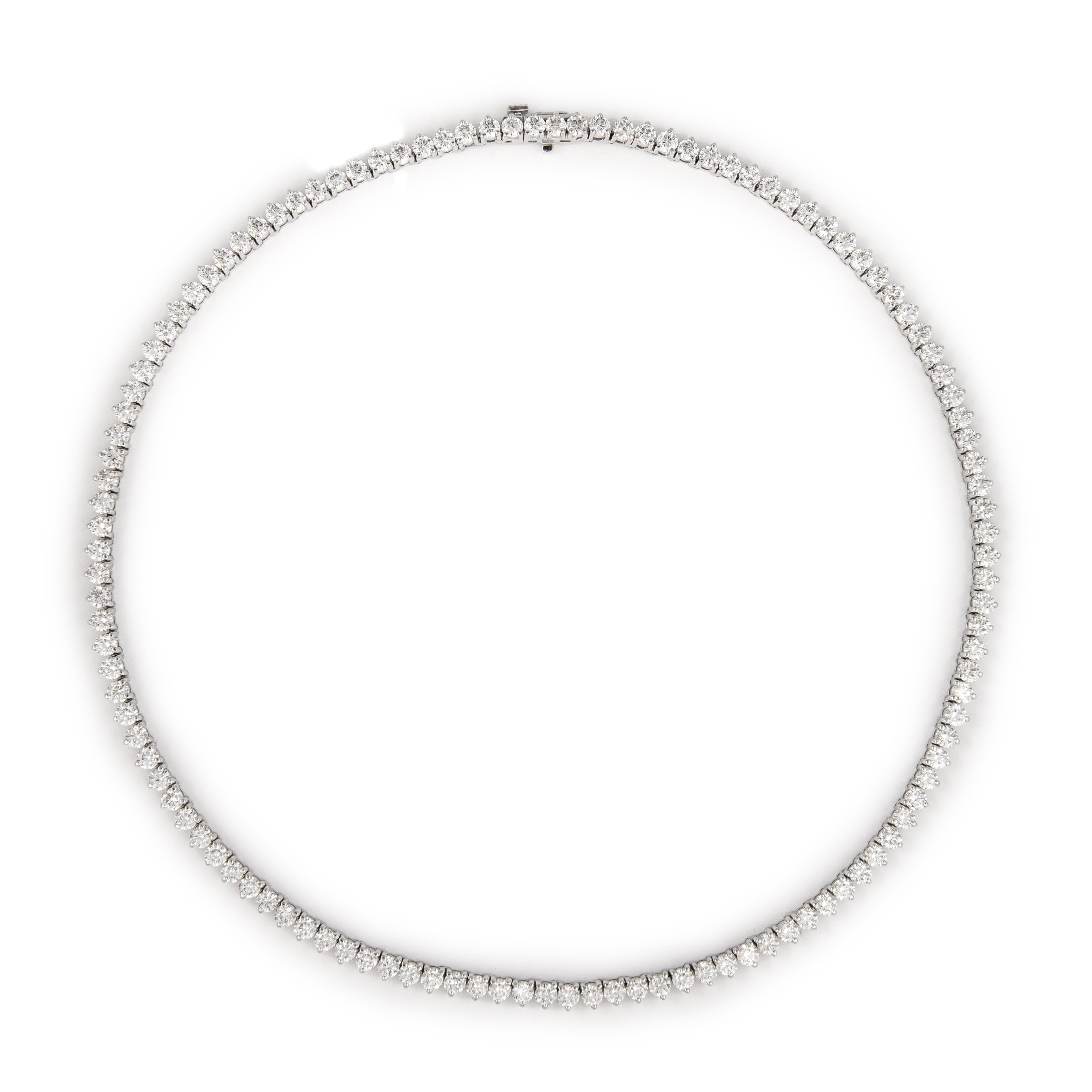 Beautiful and classic diamond tennis necklace, by Alexander Beverly Hills.
119 round brilliant diamonds, 16.26 carats. Approximately H/I color and SI clarity. 18k white gold, 30.76 grams, prong set, 16in.
Accommodated with an up-to-date appraisal by