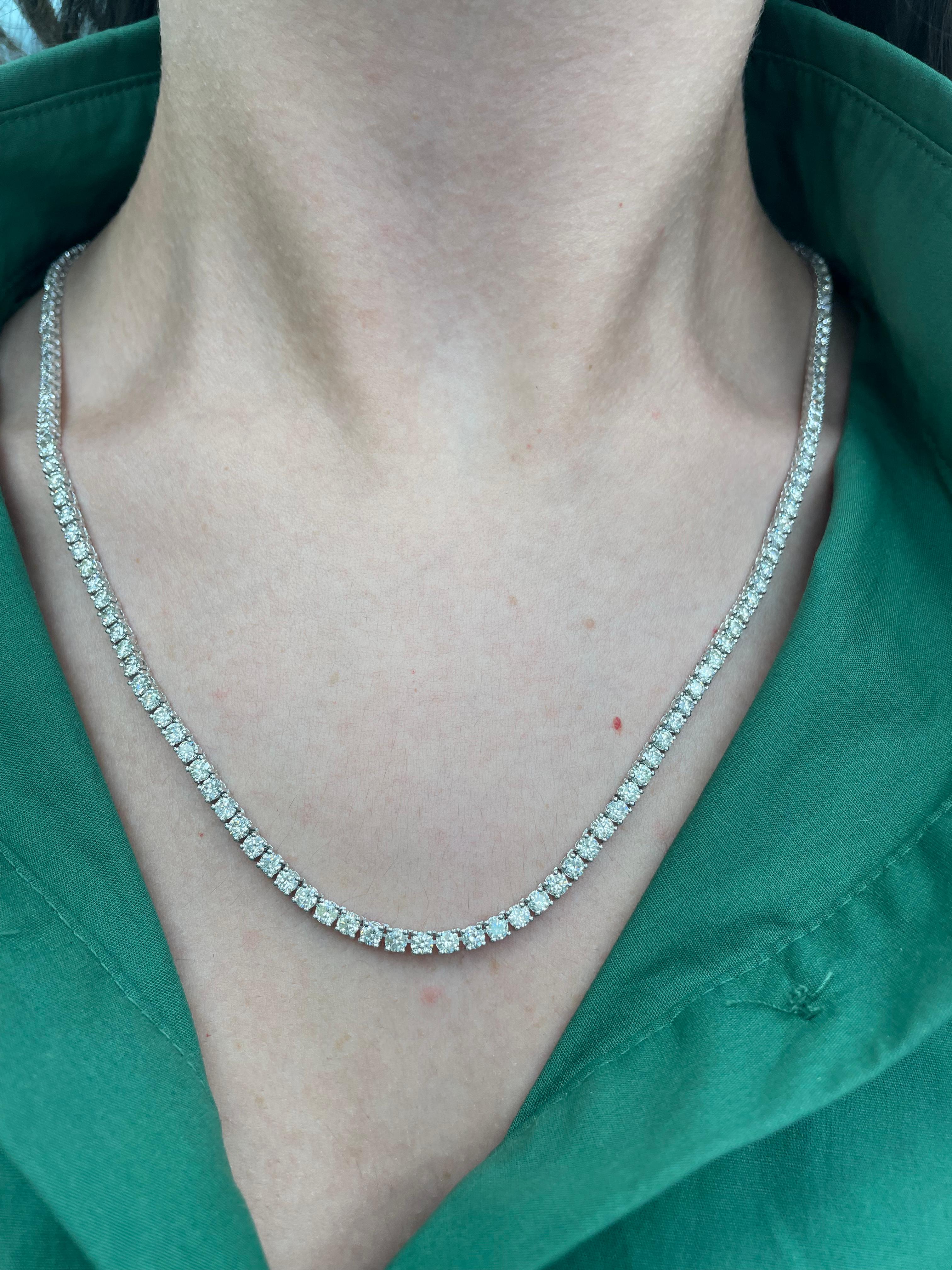Beautiful and classic long diamond tennis necklace, by Alexander Beverly Hills.
16.68 carats of round brilliant diamonds, approximately G/H color and VS clarity. 14k white gold, 25.24 grams, prong set, 22in.
Accommodated with an up-to-date appraisal
