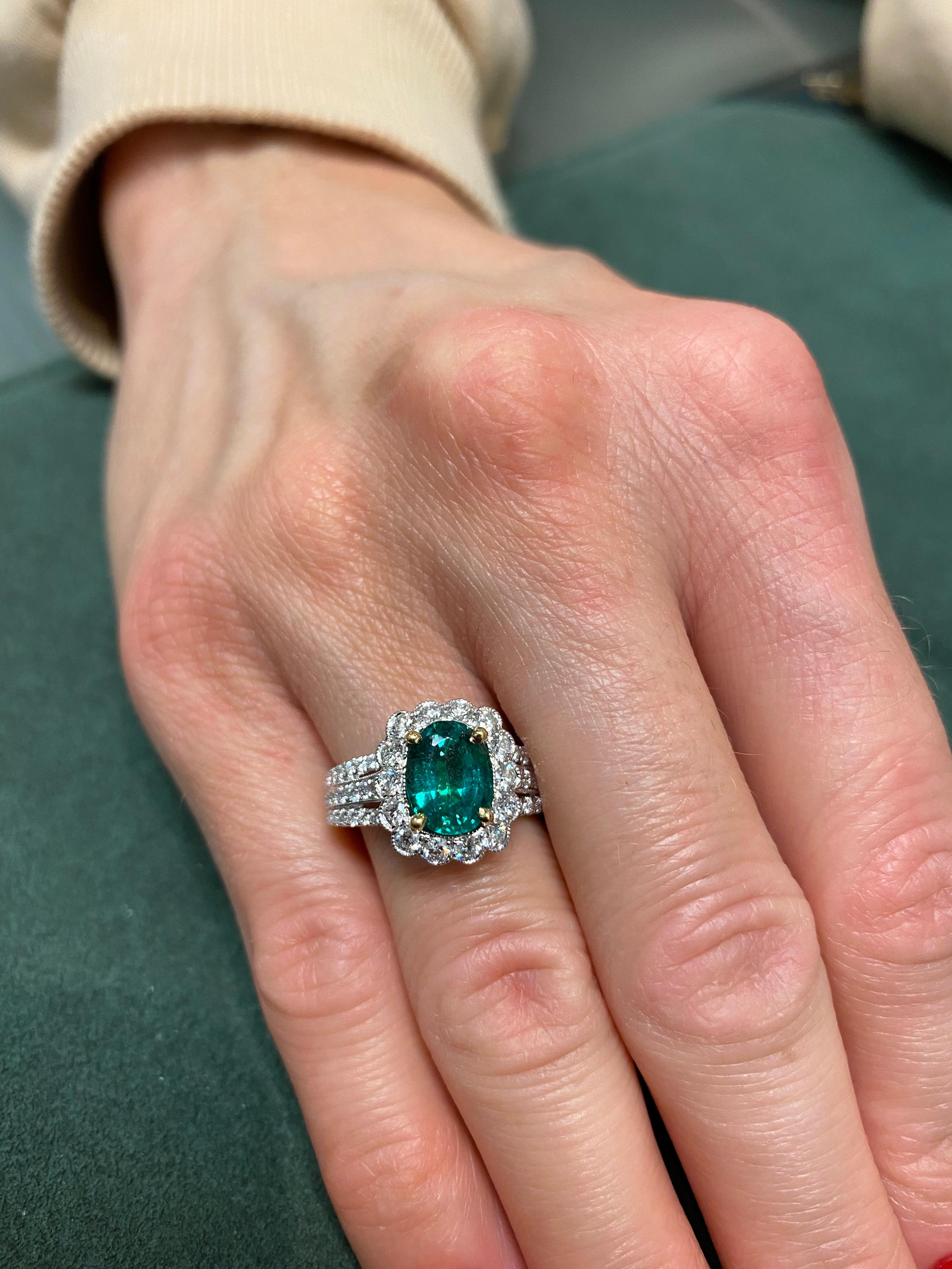 Women's Alexander 1.72 Carat Emerald with Diamond Halo Ring 18 Karat White Gold