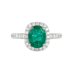 Alexander 1.72 Carat Emerald with Diamond Halo Ring 18 Karat White Gold