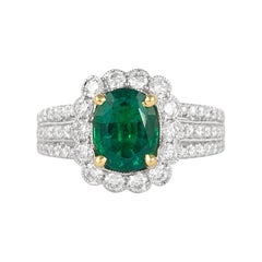 Alexander 1.72 Carat Emerald with Diamond Halo Ring 18 Karat White Gold