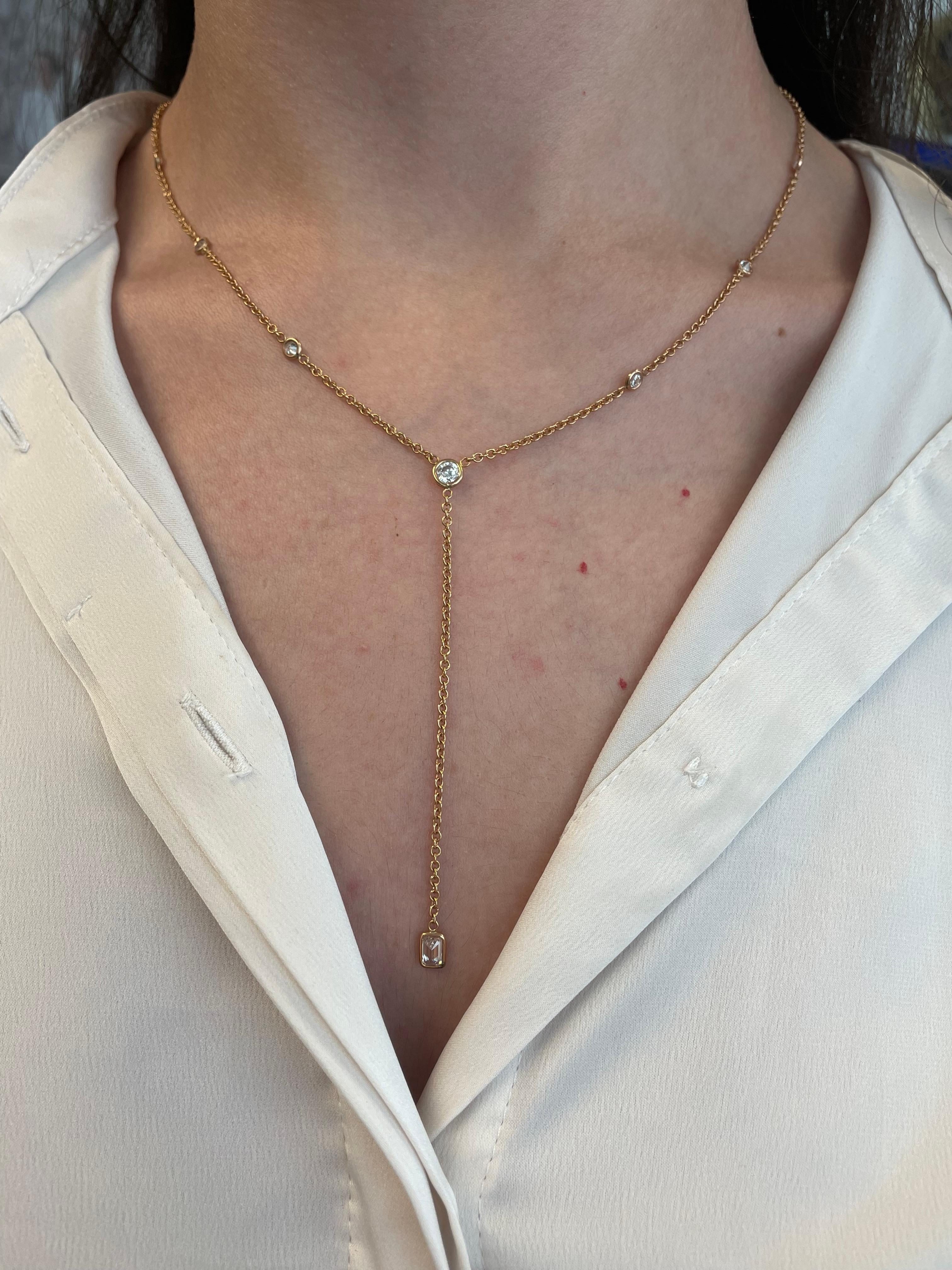 Exquisite round & emerald cut diamonds by the yard necklace, with drop. By Alexander Beverly Hills.
8 total diamonds, 1.26 carats total. 1 emerald cut diamond, 0.38ct. Approximately G/H color and VS clarity. 7 round brilliant diamonds, 0.88 carats.