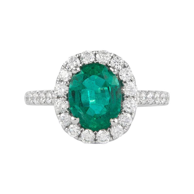 Alexander 1.97 Carat Emerald with Diamond Halo Ring 18 Karat White Gold