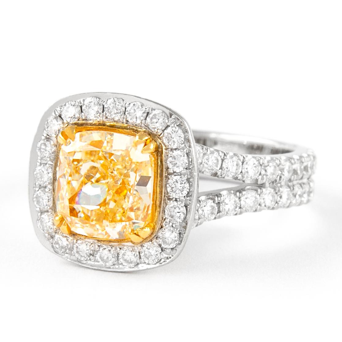 Contemporary Alexander 2.11ct Fancy Intense Yellow VS1 Cushion Diamond with Halo Ring 18k For Sale