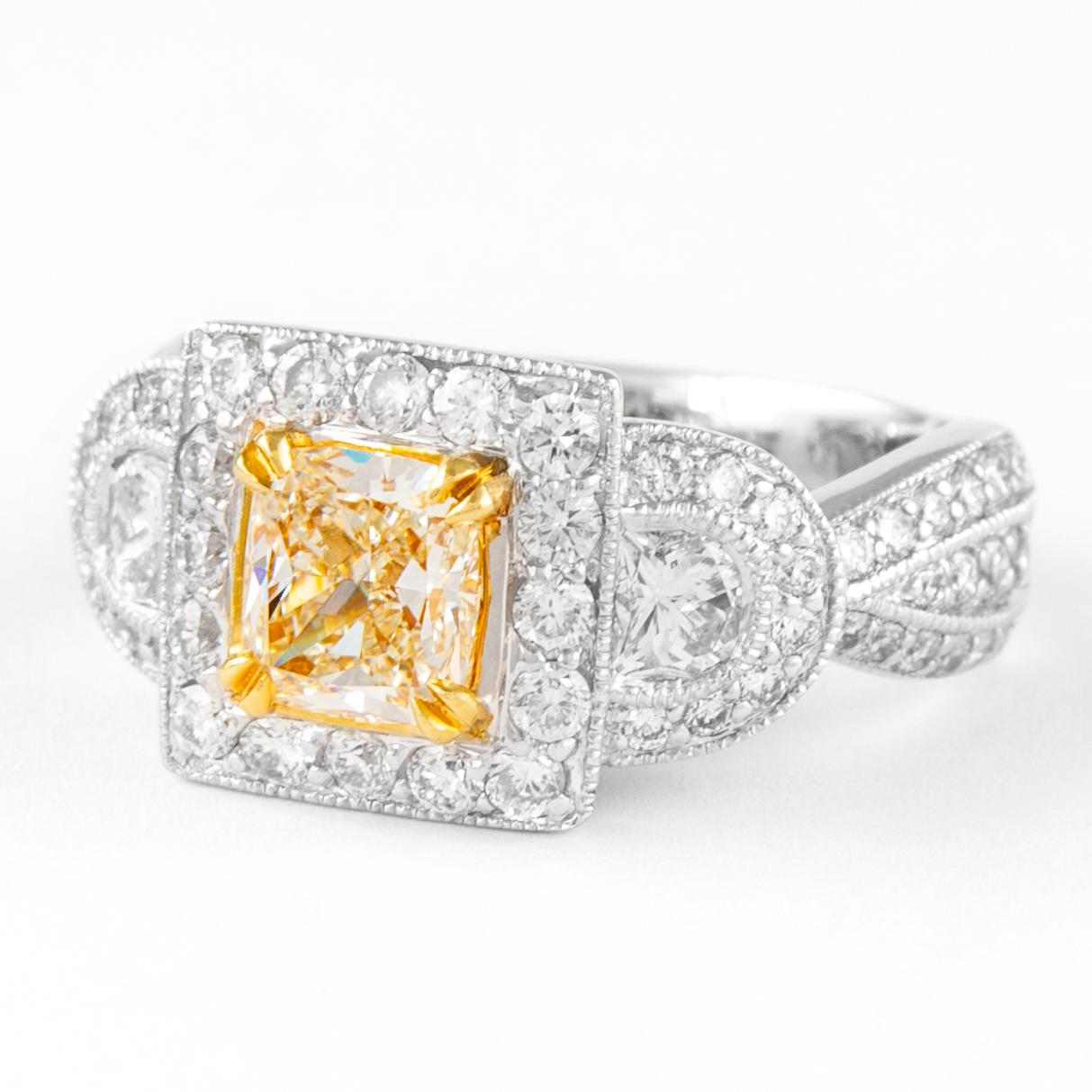 Contemporary Alexander 2.63ctt Fancy Yellow Cushion Diamond Three Stone with Halo Ring 18k  For Sale