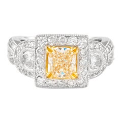 Alexander 2.63ctt Fancy Yellow Cushion Diamond Three Stone with Halo Ring 18k
