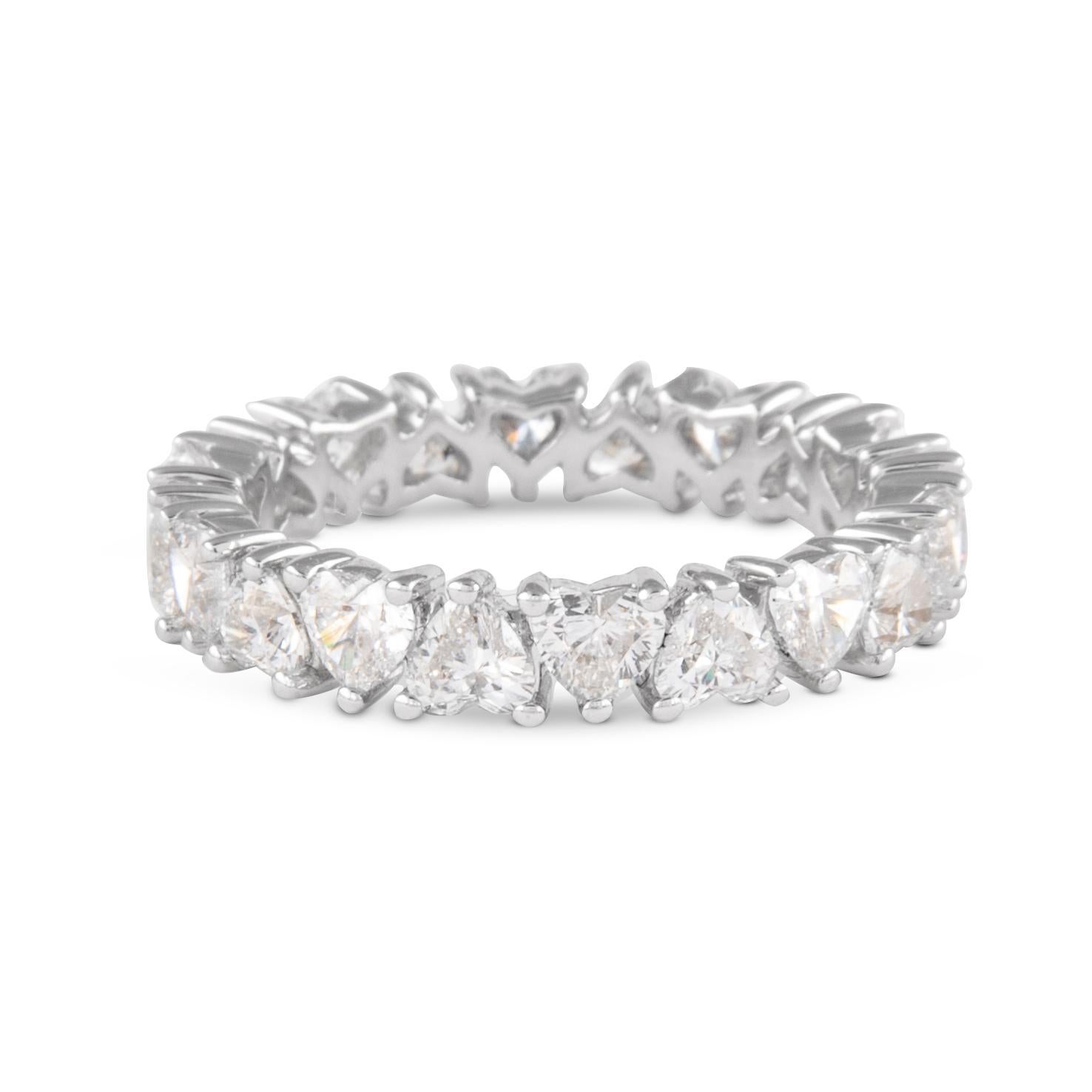 Stunning heart shape diamond eternity band, alternating, By Alexander Beverly Hills.
20 heart brilliant diamonds, 2.82 carats. D-F color and VVS clarity. Set in 18k white gold, 2.96 grams, size 6.75. 
Accommodated with an up to date appraisal by a