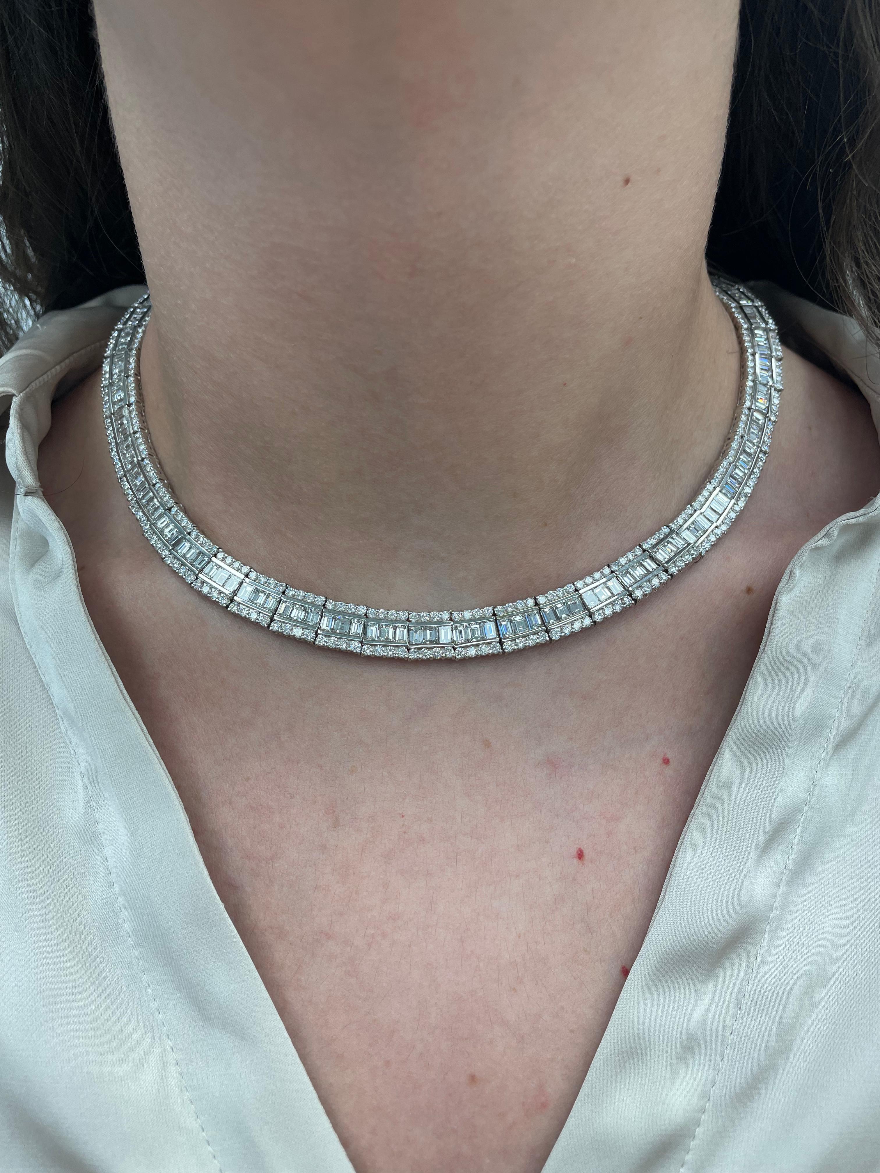 Glamorous baguette cut diamond necklace. High jewelry by Alexander Beverly Hills.
159 baguette cut diamonds, 21.56 carats. Approximately F/G color and VS clarity. Complimented by 424 round brilliant diamonds, 10.17 carats. Approximately F/G color