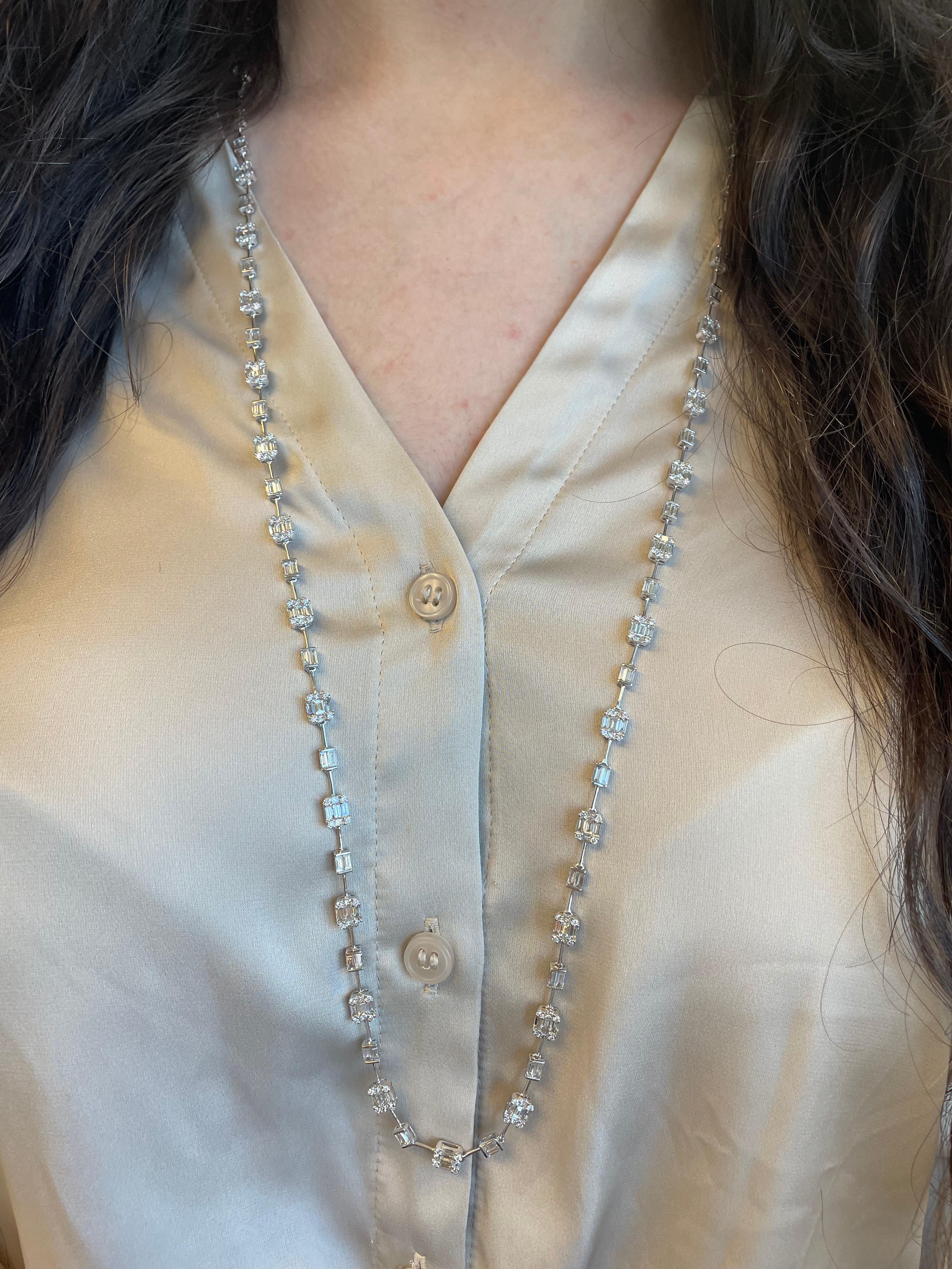 Modern illusion set diamond tennis necklace, with the look of emerald cut diamonds. By Alexander Beverly Hills.
440 round, princess, and baguette cut diamonds, 11.36 carats total. Baguette and princess cut shape diamond pattern, illusion set.