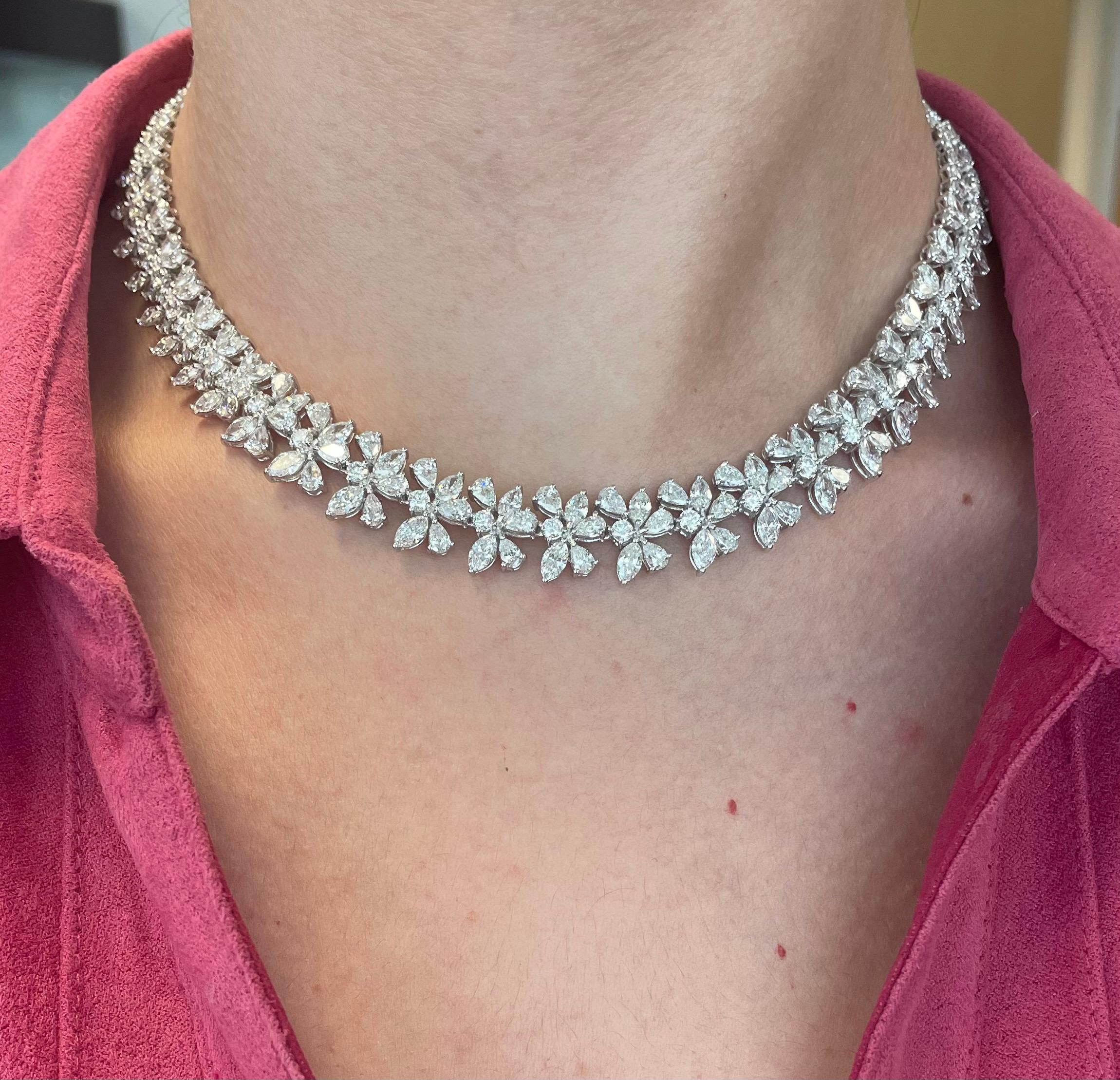 Exquisite multi diamond necklace. Perfect as a wedding / bridal necklace. High jewelry by Alexander Beverly Hills.
312 round, marques, and pear cut diamonds, 33.65 carats total. Approximately G/H color and VS clarity. Four prong set in 18k white
