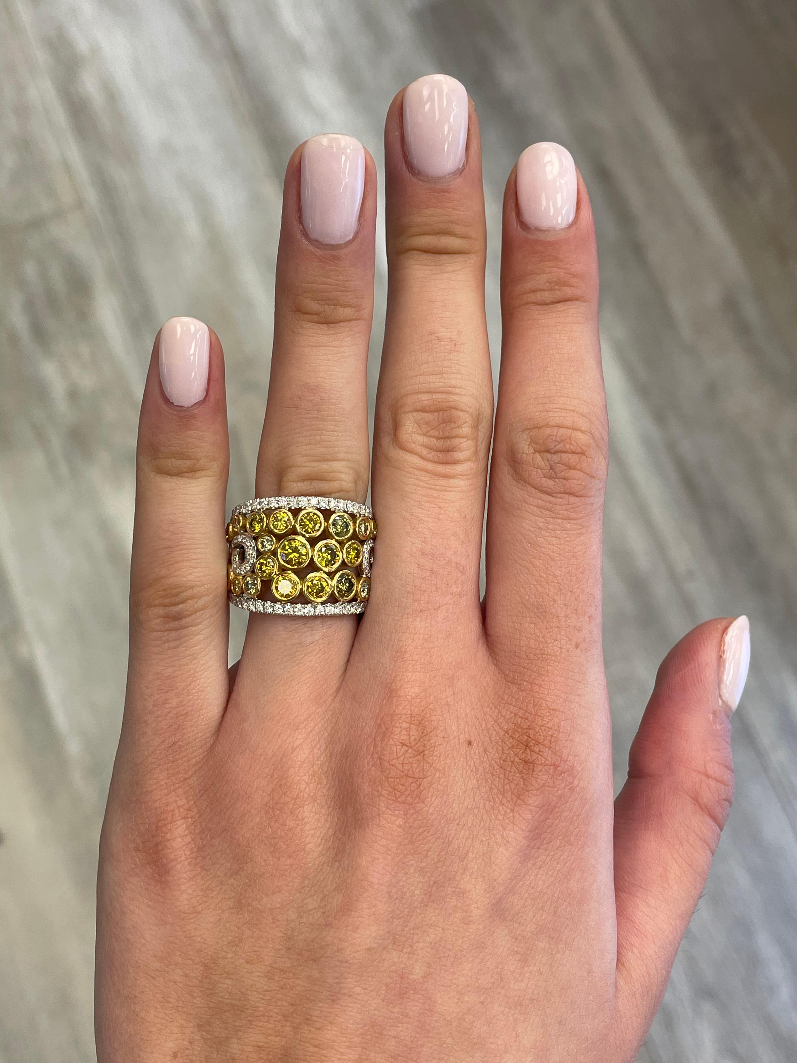 Stunning bezel set multi yellow diamond ring with two rows of round diamonds, by Alexander Beverly Hills. 
3.55 carats total diamond weight.
23 round diamonds ranging from approximately fancy brownish yellow to fancy light yellow, 2.64 carats. 134
