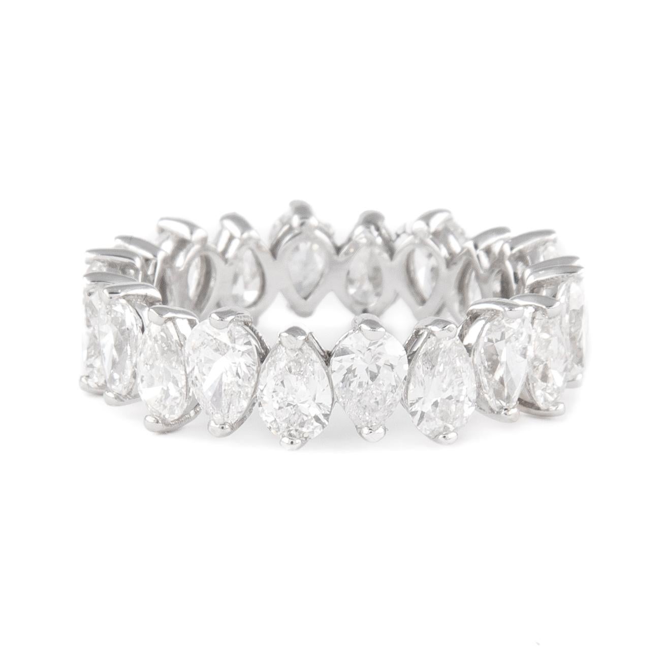 Stunning pear shape diamond eternity band, alternating, By Alexander Beverly Hills.
20 heart brilliant diamonds, 3.73 carats. F/G color and VS clarity. Set in 18k white gold, 2.99 grams, size 6. 
Accommodated with an up to date appraisal by a GIA