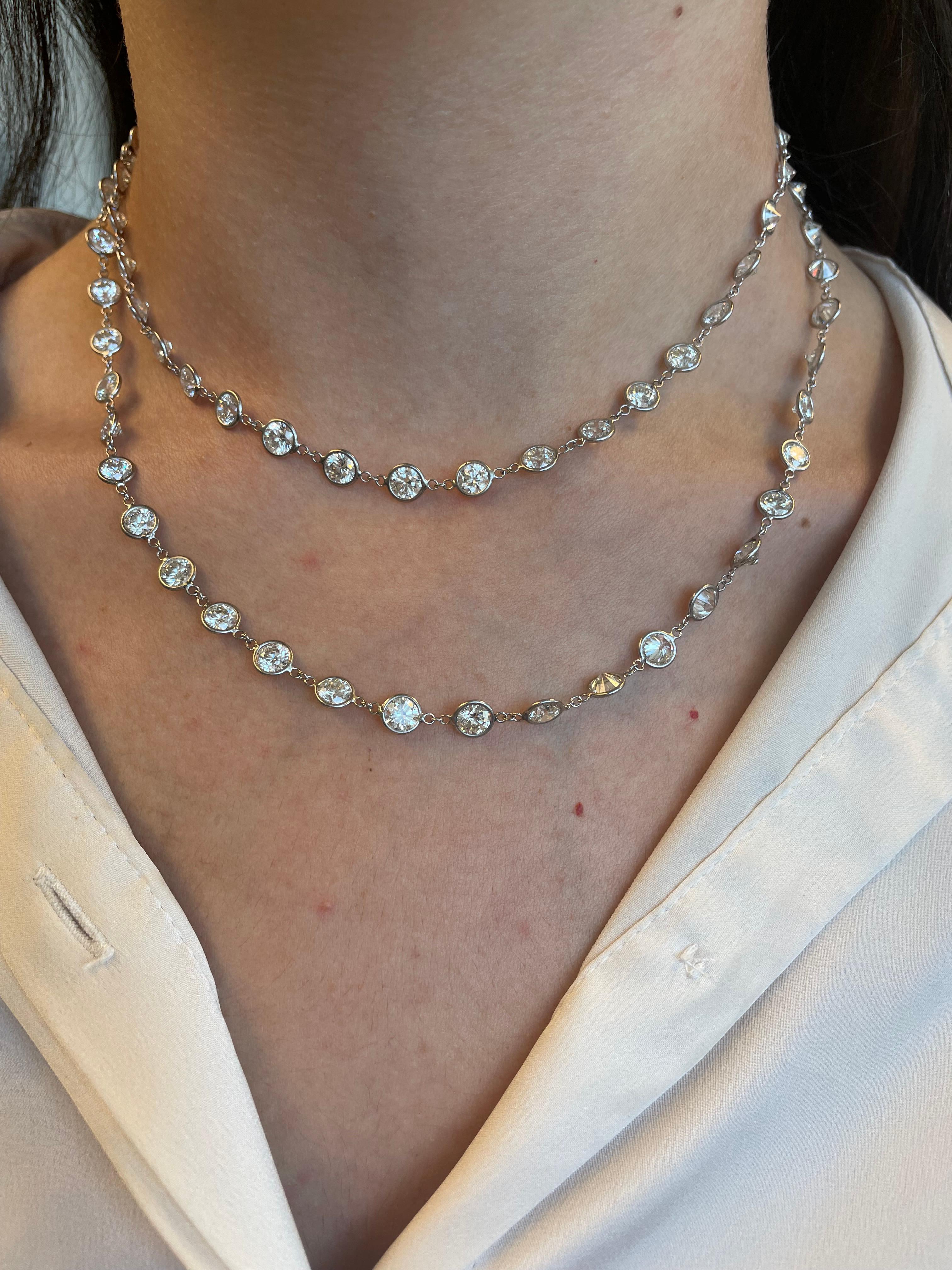 Exquisite round brilliant diamonds by the yard modern necklace. By Alexander Beverly Hills.
75 round brilliant diamonds each stone averaging 0.50ct, 37.50 carats total. Approximately G/H color and SI clarity. Bezel set in 18k white gold.