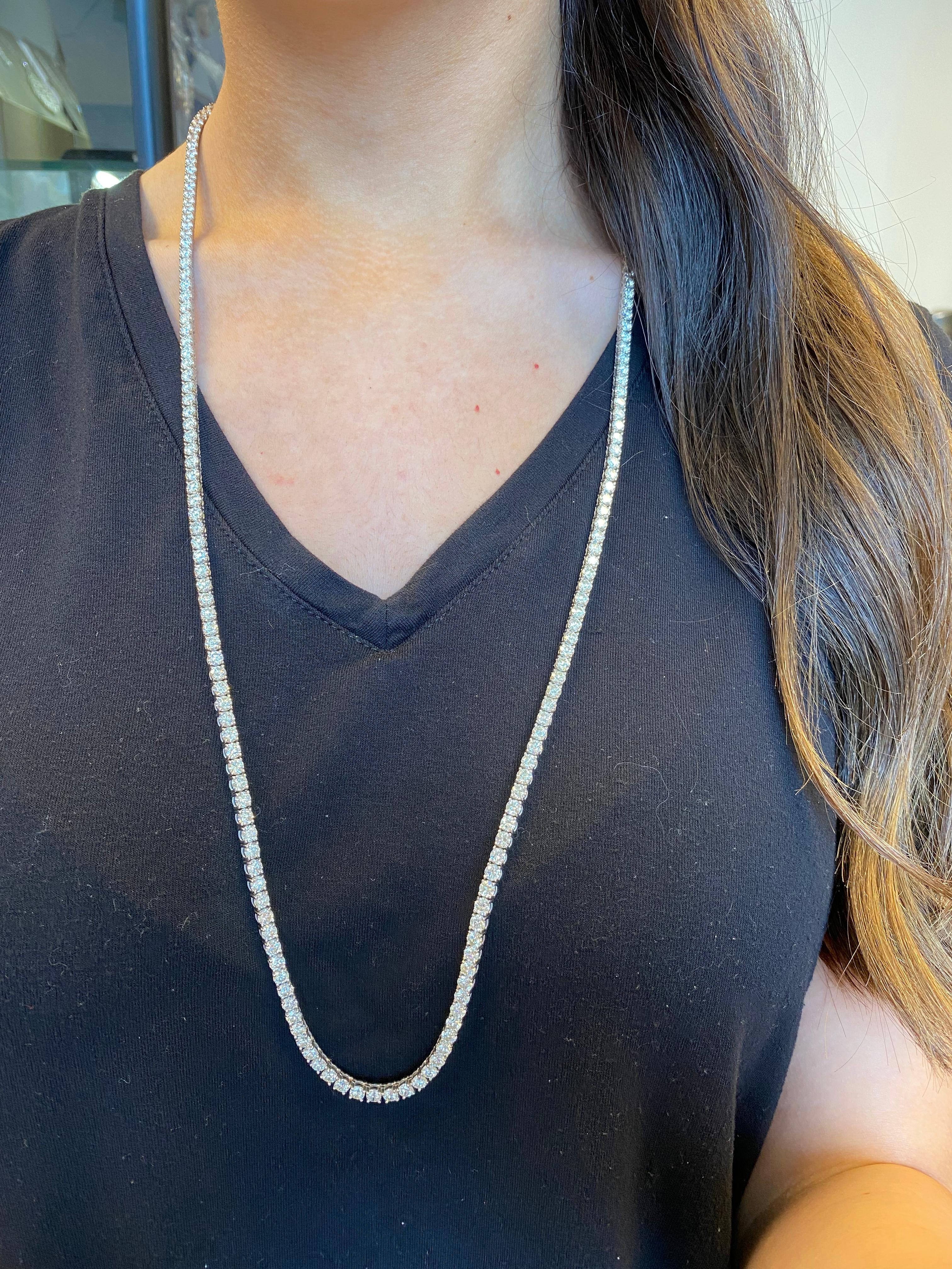 Exquisite and timeless diamonds tennis necklace. High jewelry by Alexander Beverly Hills.
205 round brilliant diamonds, 39.07 carats total. Approximately G/H color and SI clarity. Four prong set in 18k white gold, 31 inches
Accommodated with an up