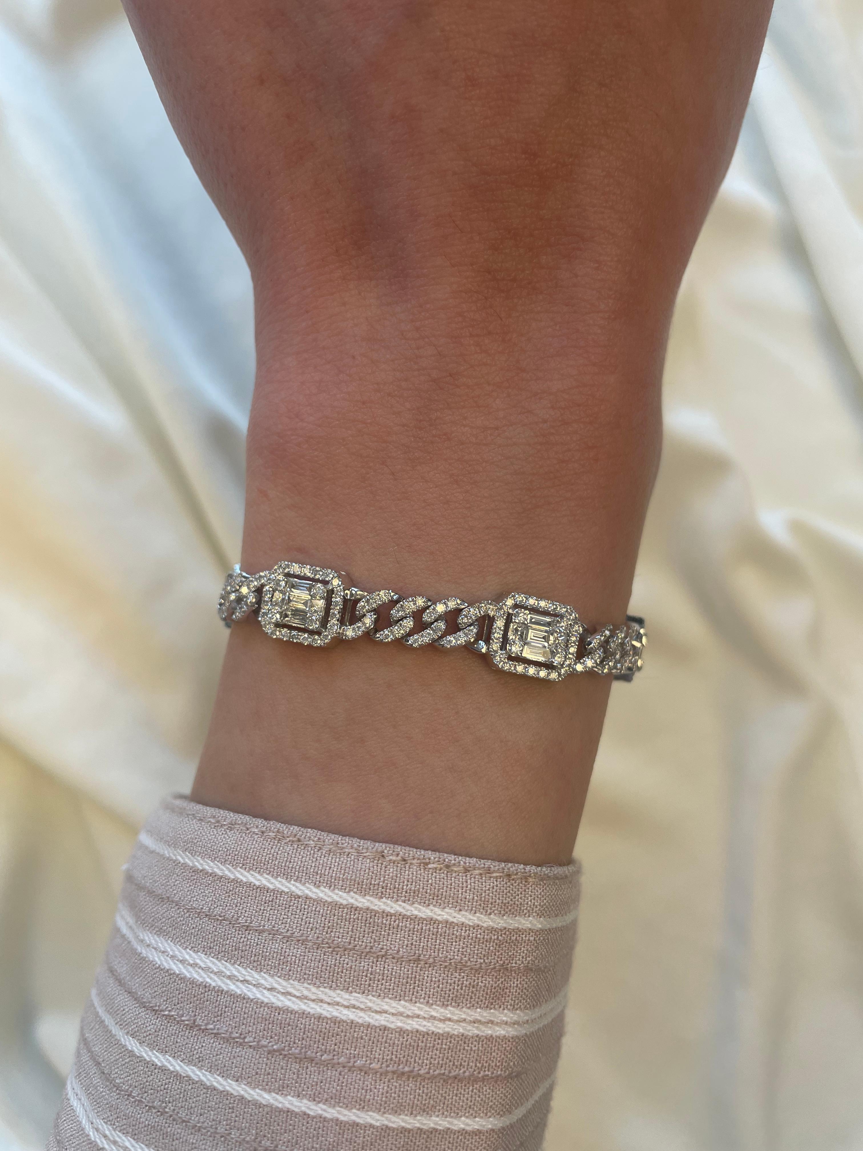 Modern diamond cuban link bracelet with illusion set diamonds. 
385 round brilliant diamonds, 3.95 carats total. Approximately G/H color and SI clarity. 18k white gold, 21.90 grams, 7 inches.
Accommodated with an up-to-date appraisal by a GIA G.G.