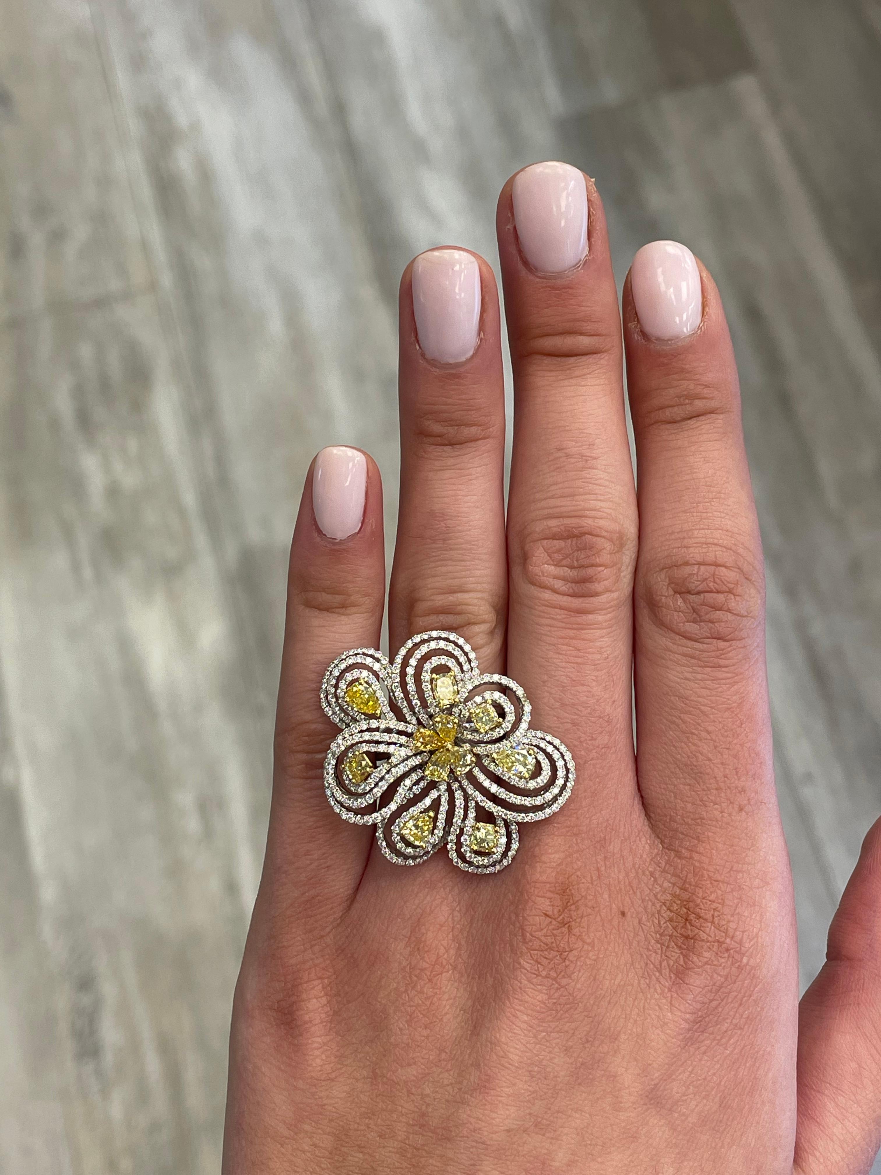 Modern yellow color diamond floral ring, by Alexander Beverly Hills. 
3.97 carats total diamond weight.
2.26 of a mix of approximately Fancy Yellow color diamonds. Complimented by 346 round brilliant cut diamonds, 1.71 carats total. Approximately