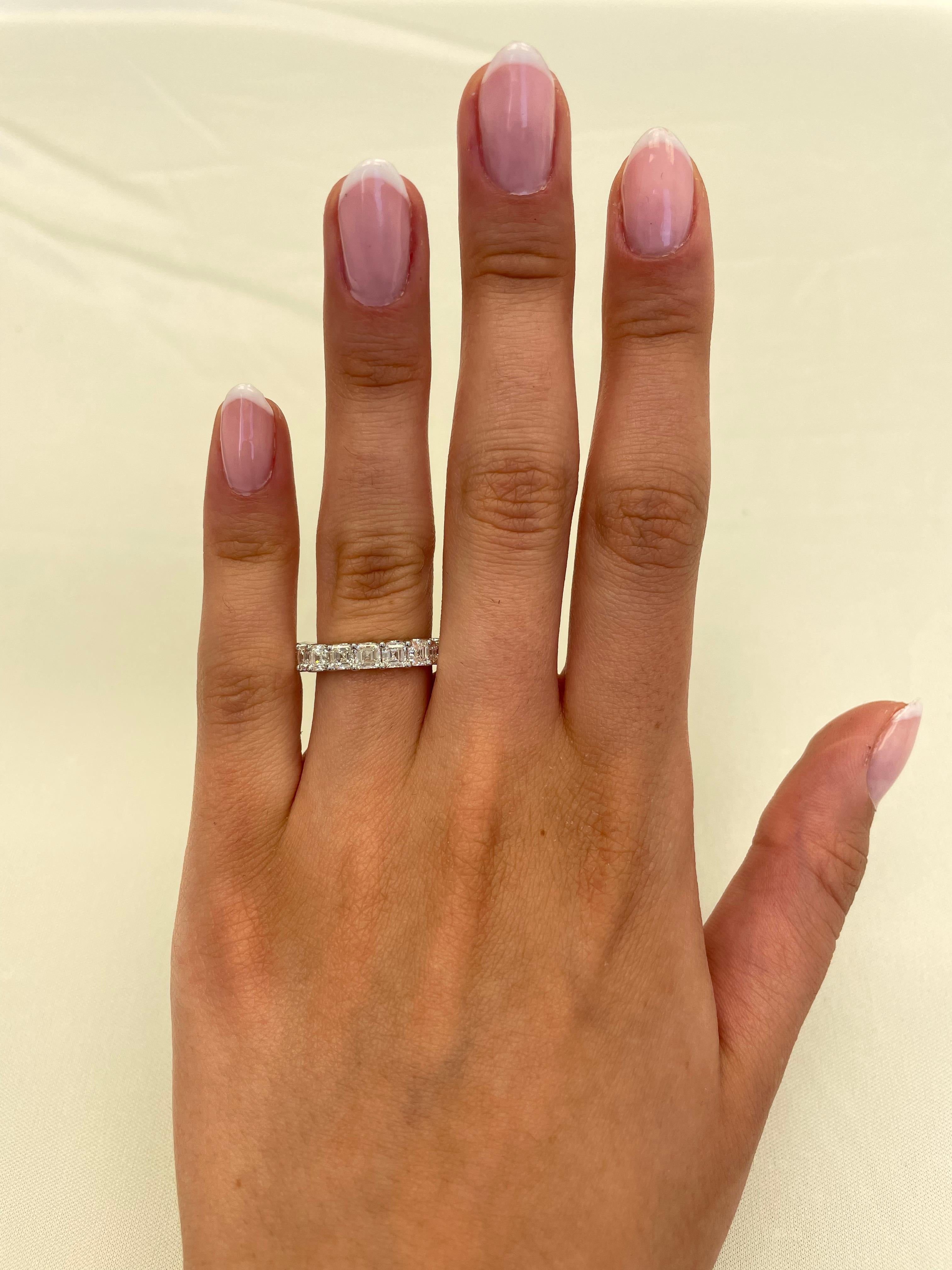 Stunning asscher cut diamond eternity band, By Alexander Beverly Hills.
19 asscher cut diamonds, 4.02 carats. D/E color and VVS clarity. 18-karat white gold, 3.57 grams, size 5.25. 
Accommodated with an up to date appraisal by a GIA G.G. upon