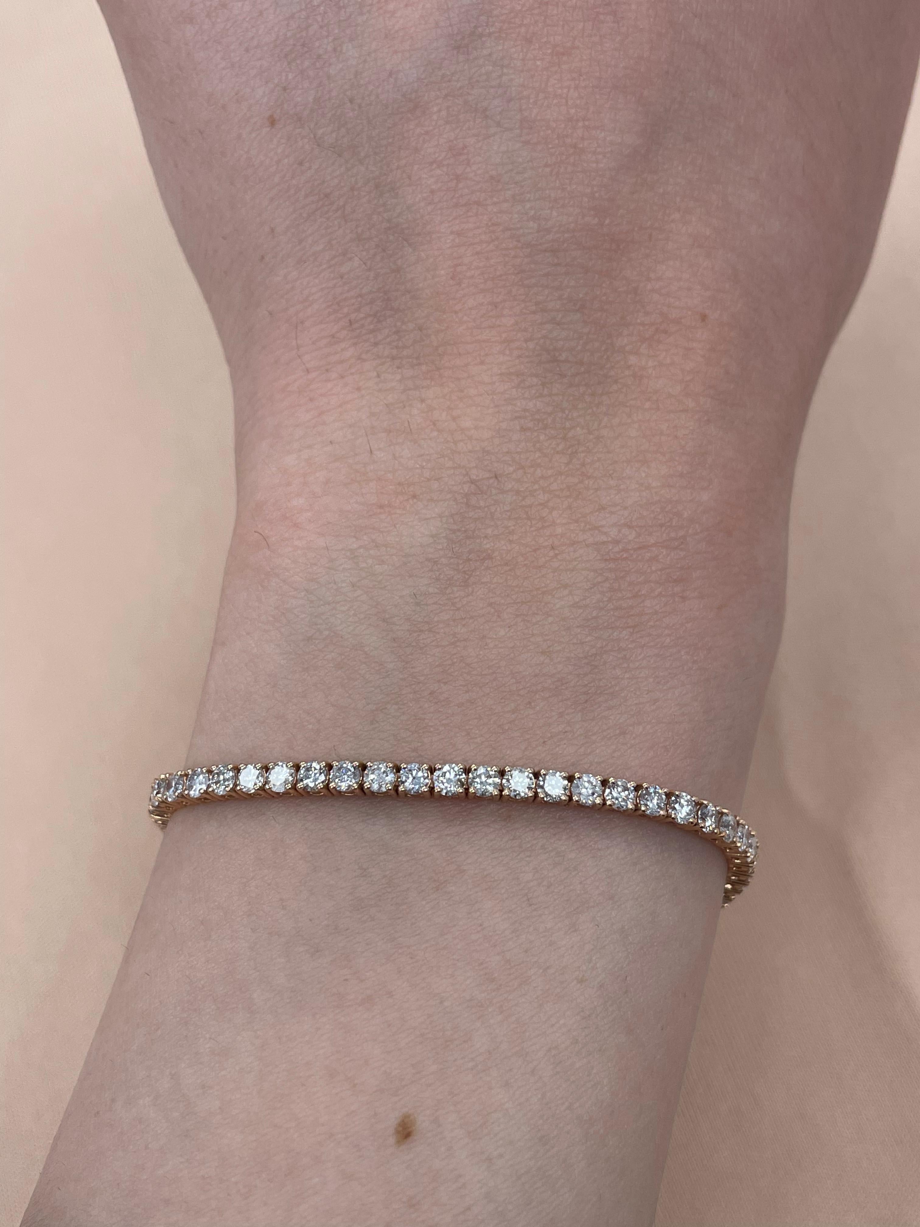 Exquisite and timeless diamonds tennis bracelet, by Alexander Beverly Hills.
66 round brilliant diamonds, 4.03 carats total. Approximately Very Light Pink color (looks like regular white diamonds in mounting) color and SI clarity. Four prong set in