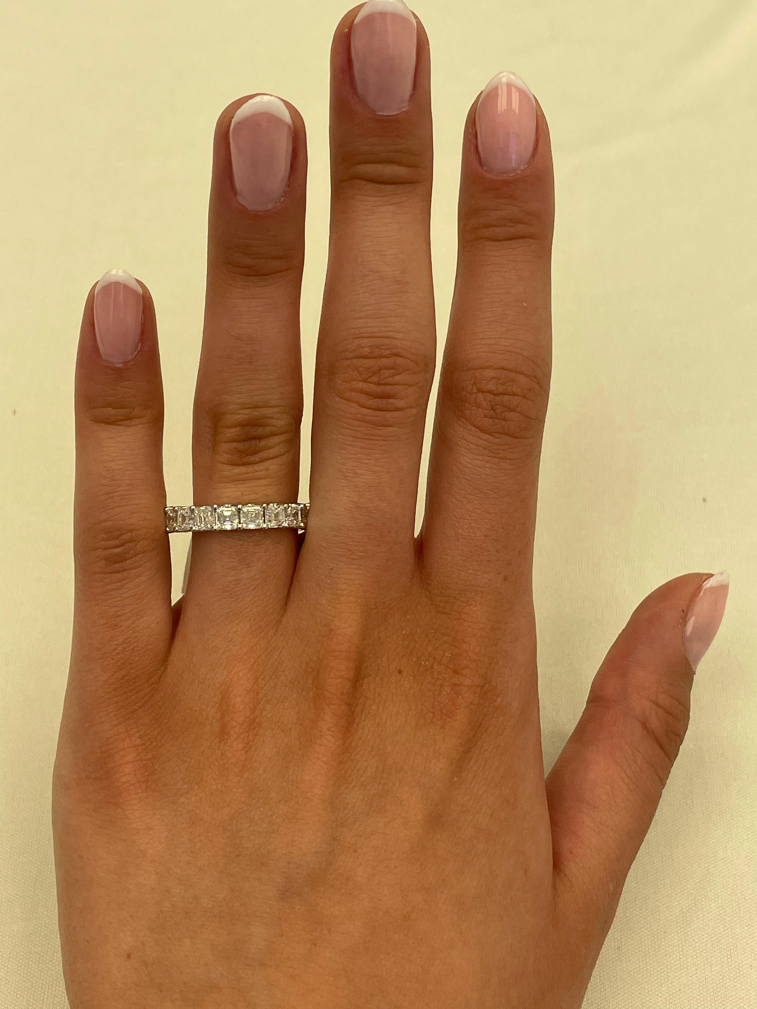 Stunning asscher cut diamond eternity band, By Alexander Beverly Hills.
20 asscher cut diamonds, 4.09 carats. D/E color and VVS clarity. 18-karat white gold, 4.09 grams, size 6. 
Accommodated with an up-to-date digital appraisal by a GIA G.G. once