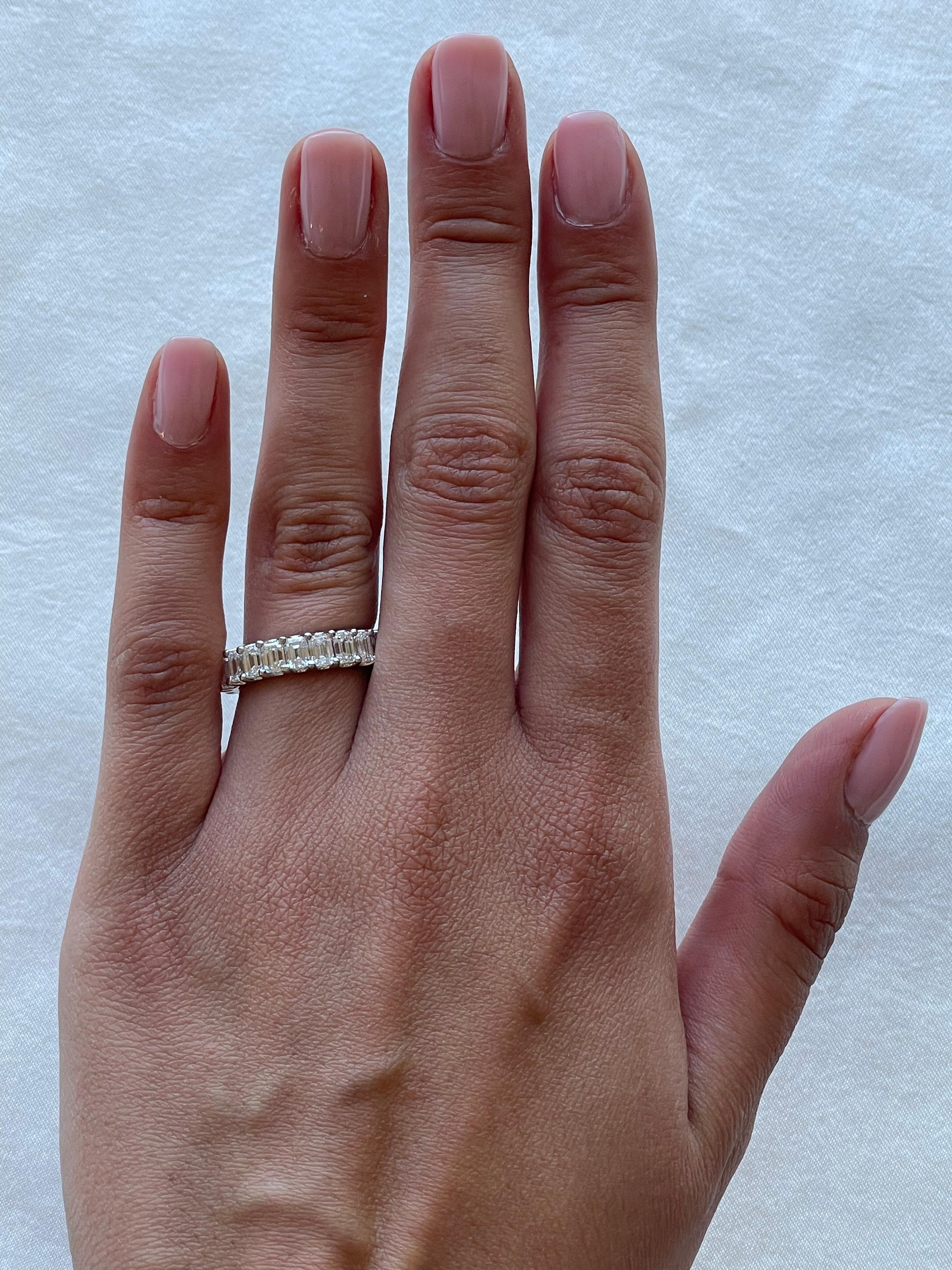 Stunning emerald cut diamond eternity band, by Alexander Beverly Hills.
22 emerald cut diamonds, 4.21 carats total. D-F color and VVS clarity. Set in 18k white gold, 3.48 grams, size 5. 
Accommodated with an up-to-date appraisal by a GIA G.G. once
